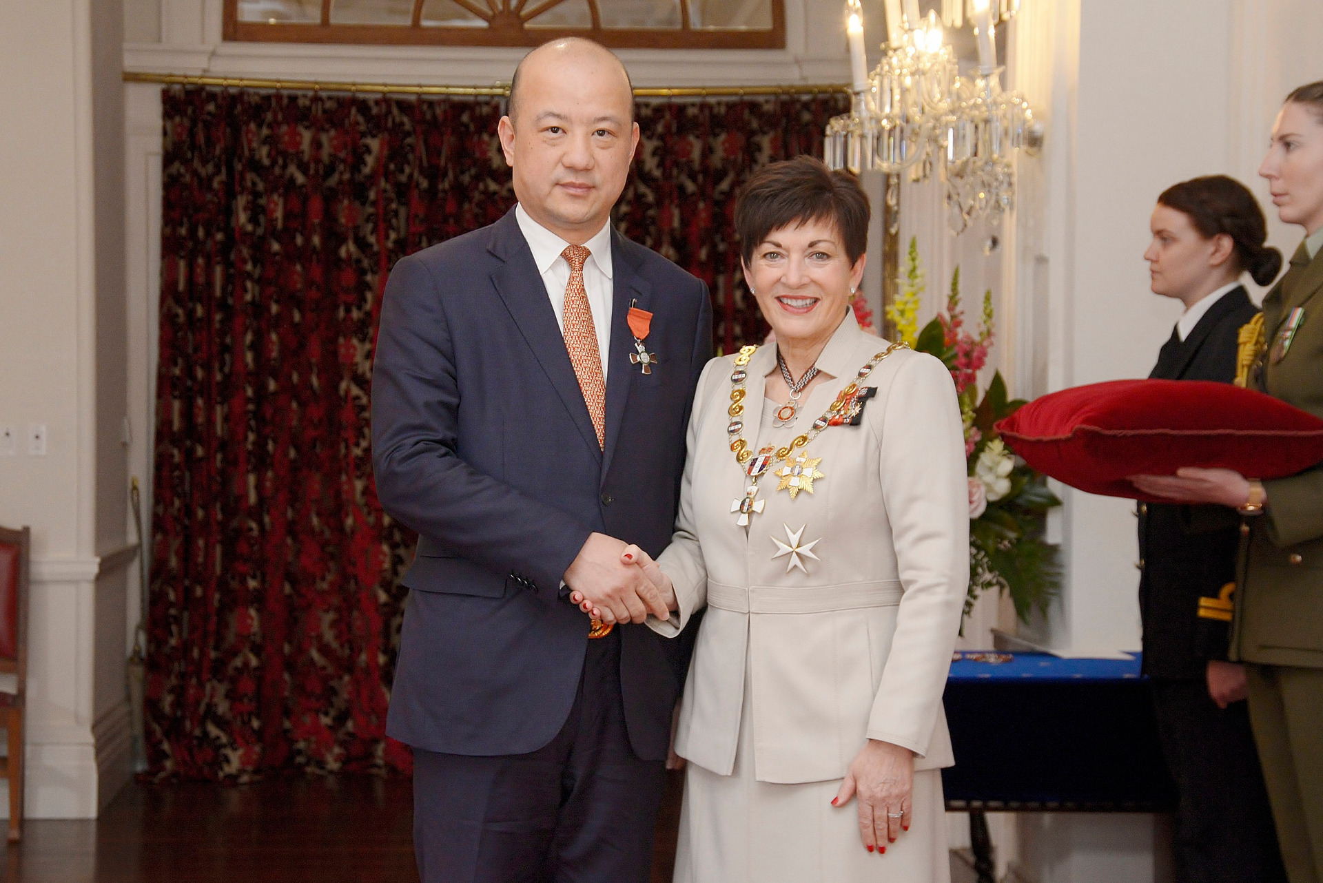 Yikun Zhang, pictured with Governor-General Dame Patsy Reddy when awarded his MNZM, for services to New Zealand-China relations and the Chinese community. Photo / Supplied