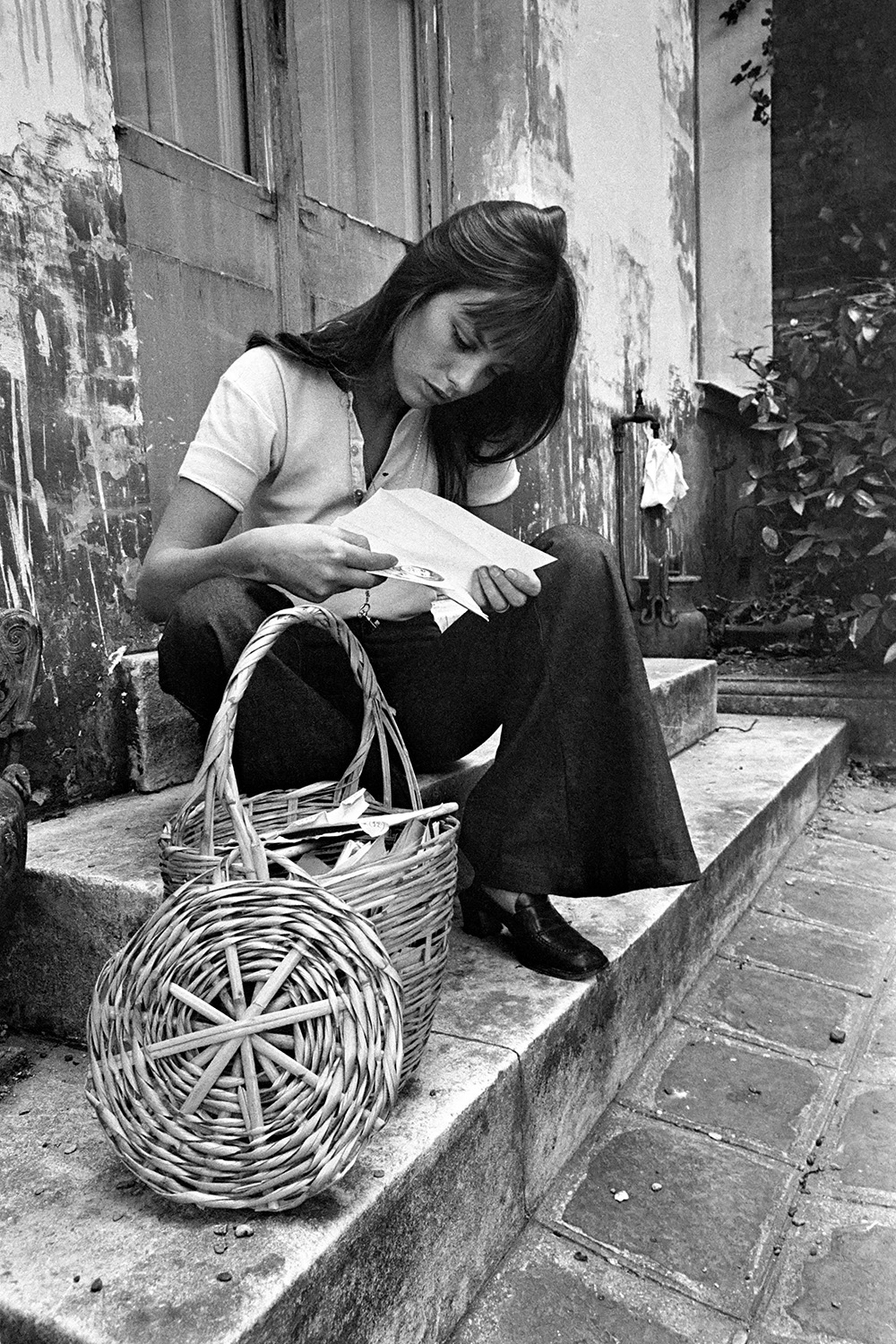Jane Birkin rummages through her famous basket bag in Paris, June 1970. Photo / Getty Images