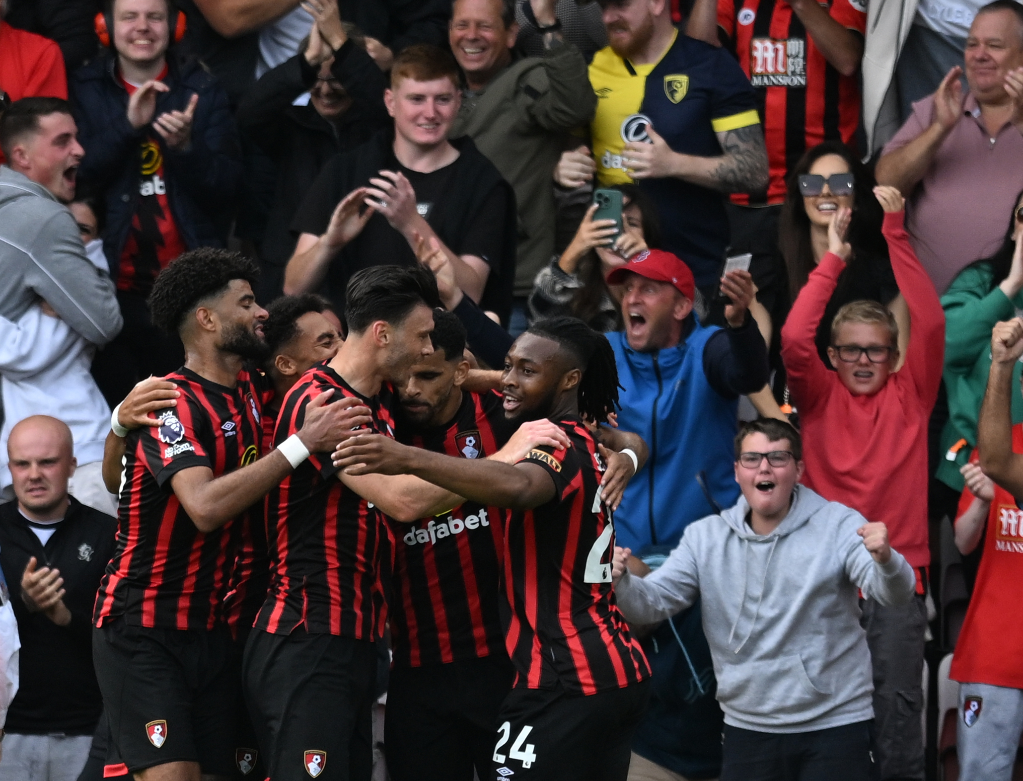 AFC Bournemouth players celebrate a goal during English Premier League game. Photo / Photosport
