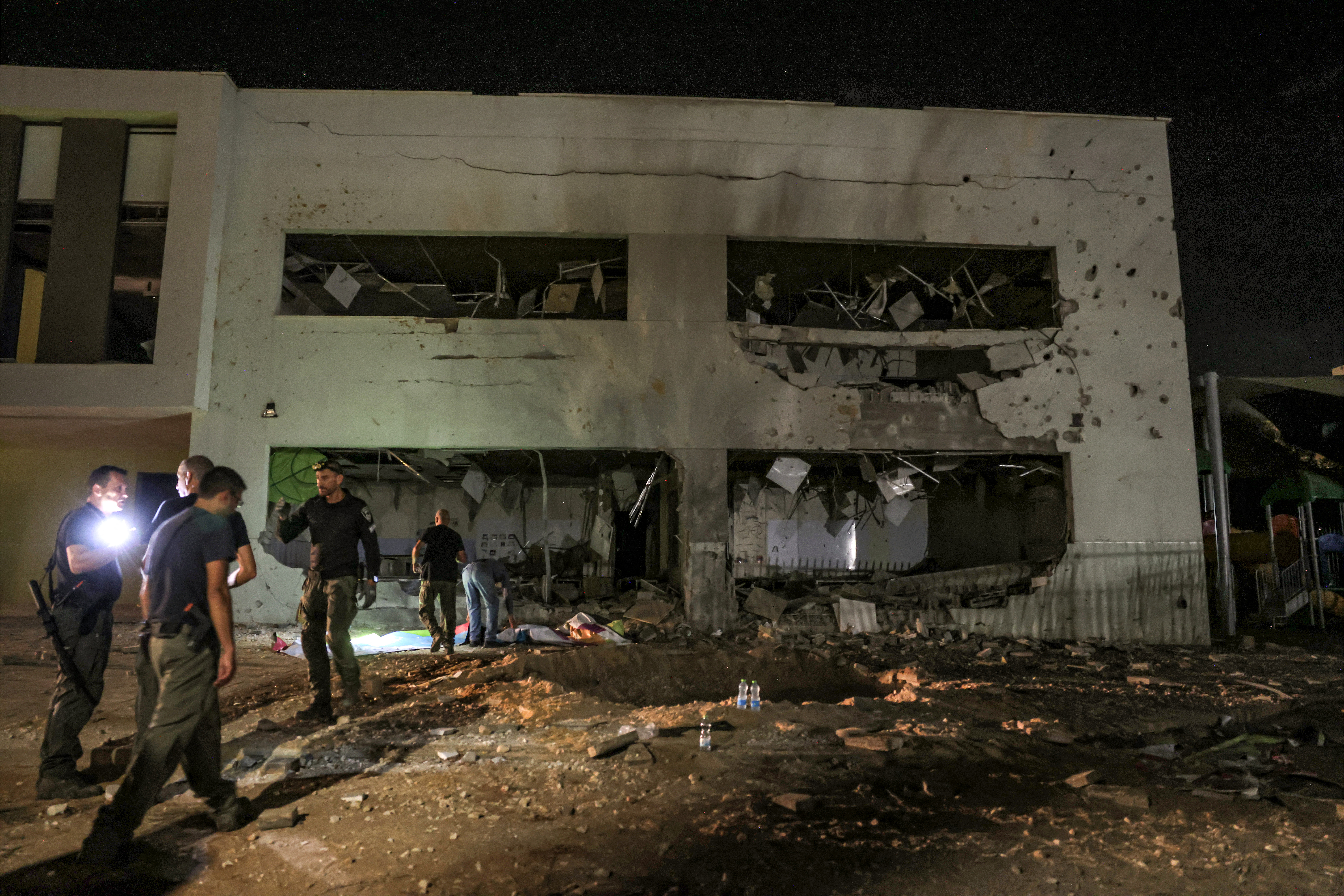 This school building was heavily damaged when a projectile exploded upon impact in Israel's southern city of Gedera on October 1. Photo / AFP