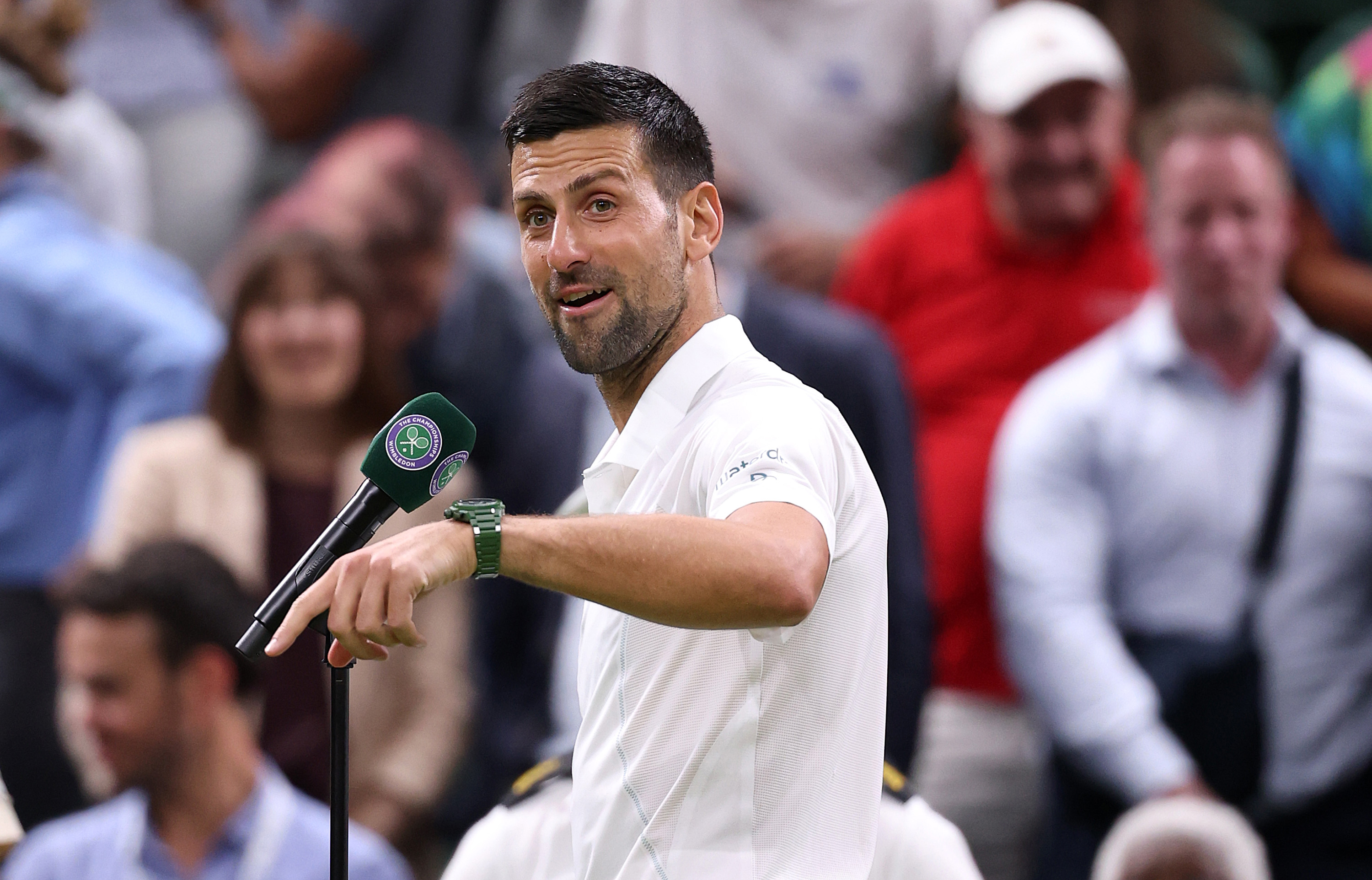 Novak Djokovic addresses the crowd after victory over Holger Rune of Denmark in his fourth-round men's singles match at Wimbledon. Photo / Getty Images