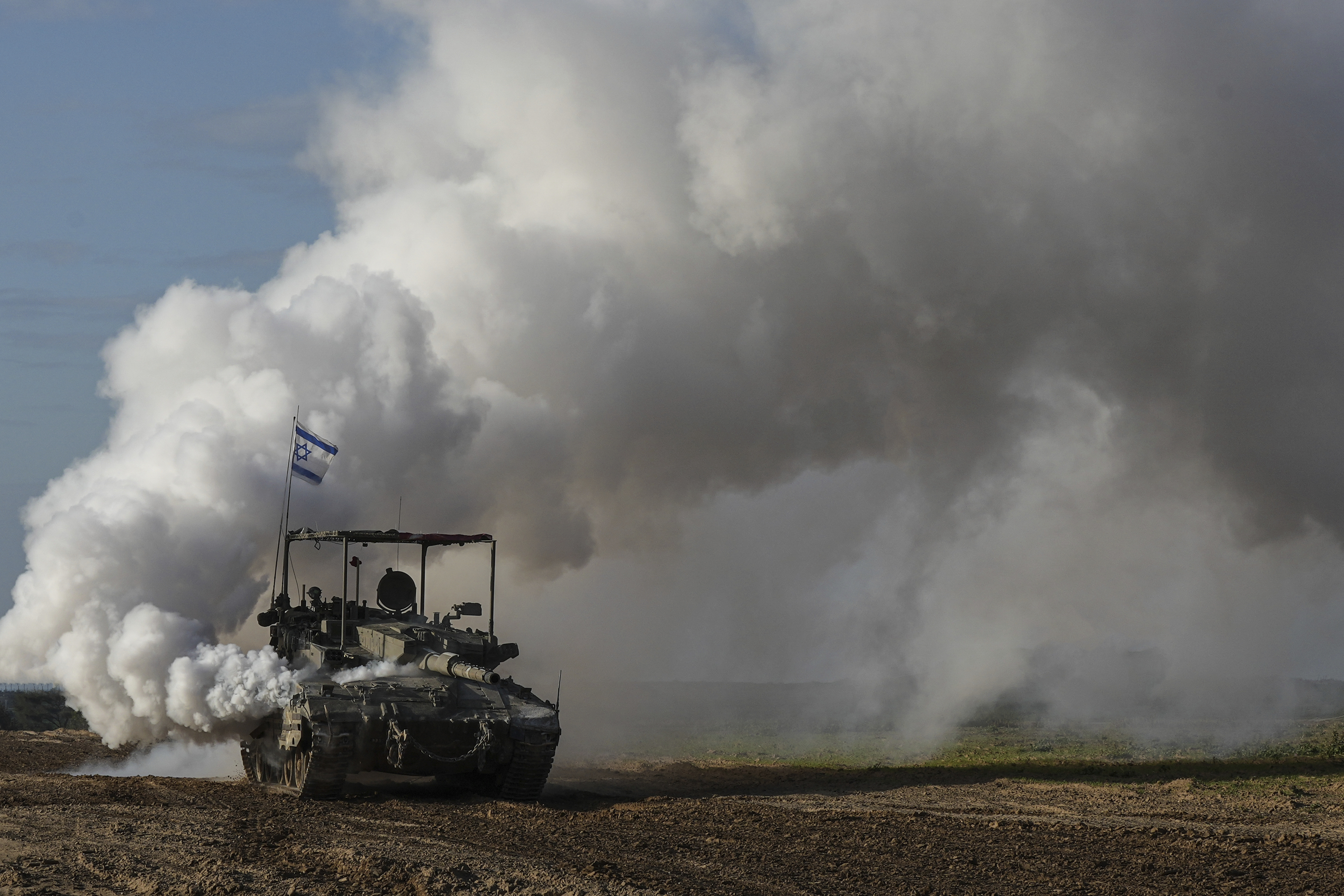 An Israeli army tank moves near the Gaza Strip border, in southern Israel. Photo / AP