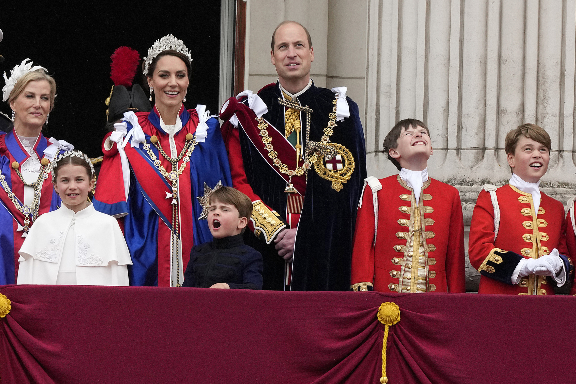 Sophie Duchess of Edinburgh, from left, Princess Charlotte, Kate Princess of Wales, Prince Louis, Prince William and Prince George, right, greet the crowd from the balcony of Buckingham Palace after the coronation ceremony of King Charles III and Queen Camilla in London, Saturday, May 6. Photo / AP