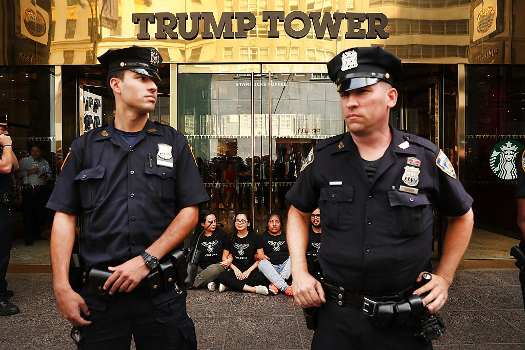 Protesters block the entrance to Trump Tower. Photo / Getty Images