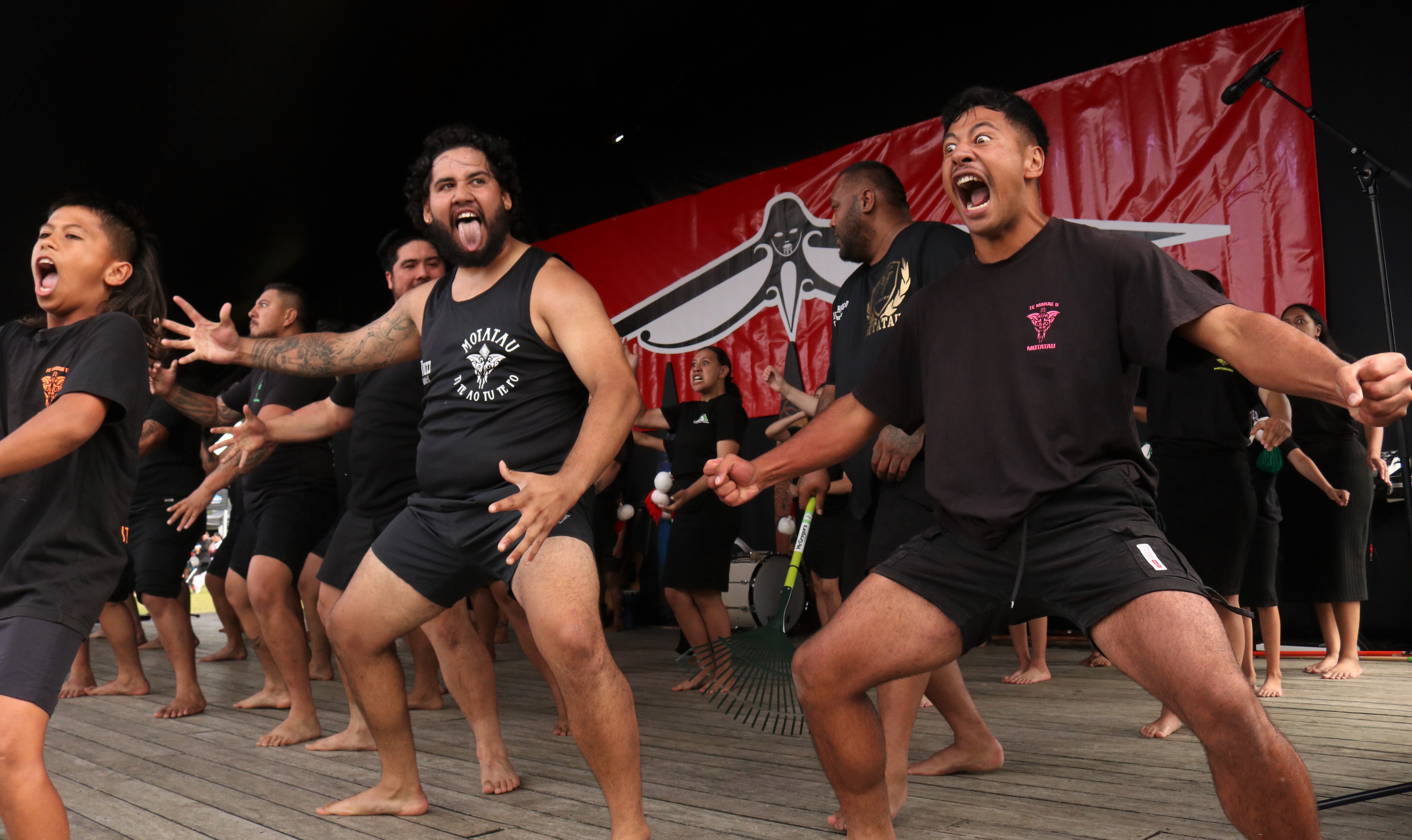 Murray Tautari (left) and Hemi Cherrington perform a haka with Motatau Marae kapa haka group. Photo / Peter de Graaf