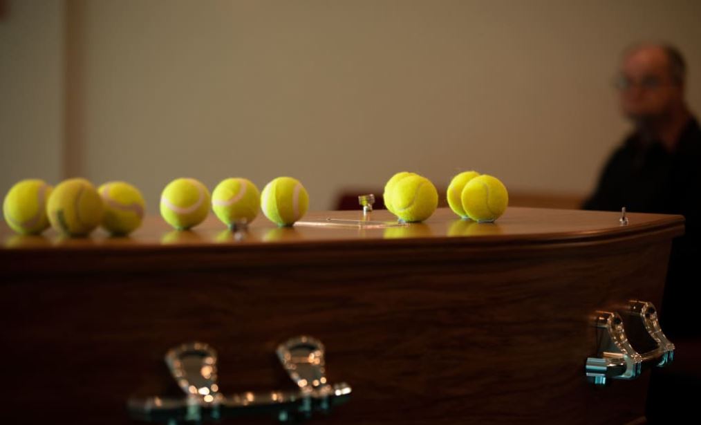 Michael Wahrlich's casket featured his beloved tennis balls.  Photo / RNZ / Samuel Rillstone