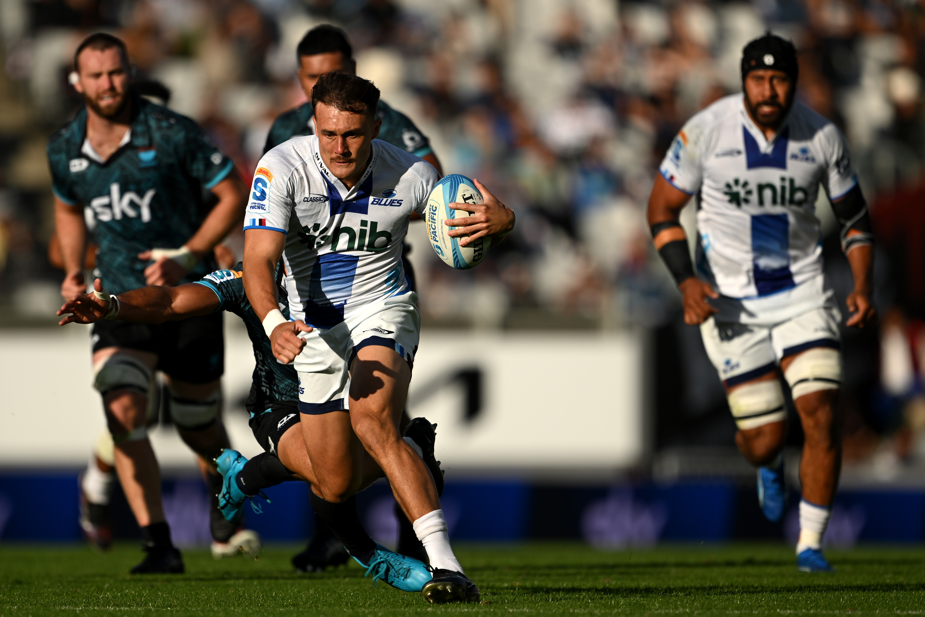 Cole Forbes makes a break for the Blues against Moana Pasifika. Photo / Getty Images