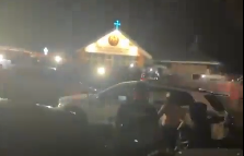 Screenshot of video showing riotous crowds outside the Christ the Good Shepherd Church following the stabbing attack.
