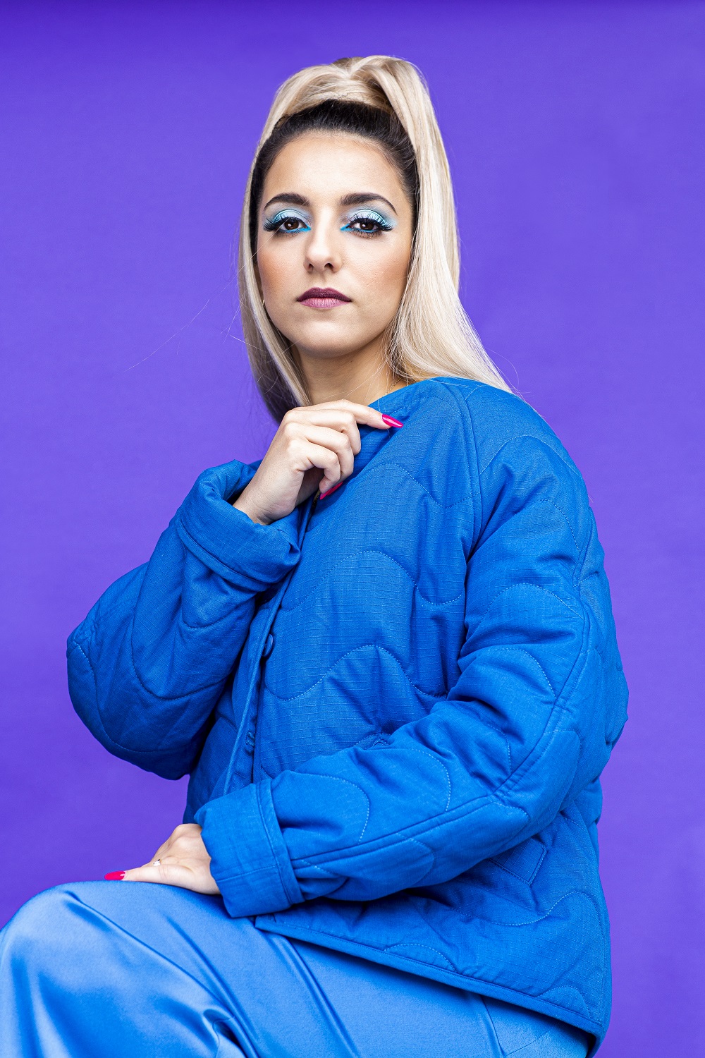 Chaii wears Kowtow jacket and Georgia Alice skirt . Photo / Babiche Martens