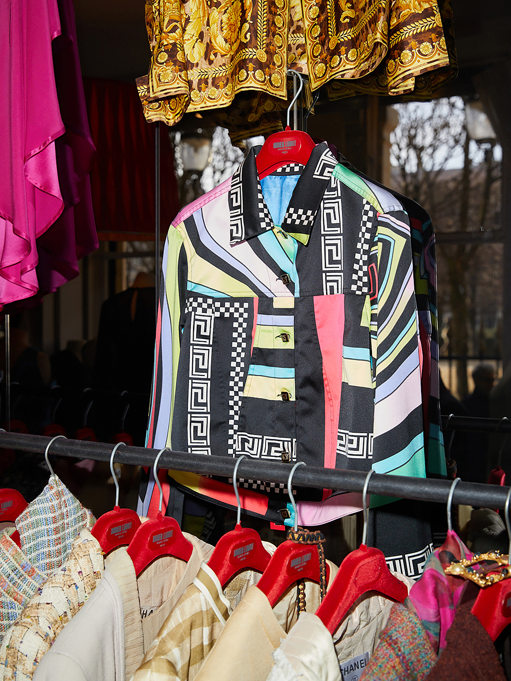 A satin-cotton print blouson jacket by Gianni Versace, circa 1990, at Didier Ludot’s boutique. Photo / Hugues Laurent, The New York Times