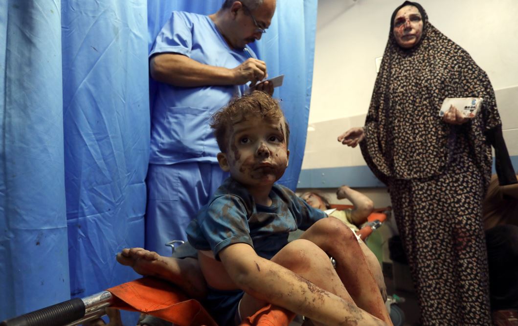 Wounded Palestinians receive treatment at the al-Shifa hospital, following Israeli airstrikes on Gaza City. Photo / AP