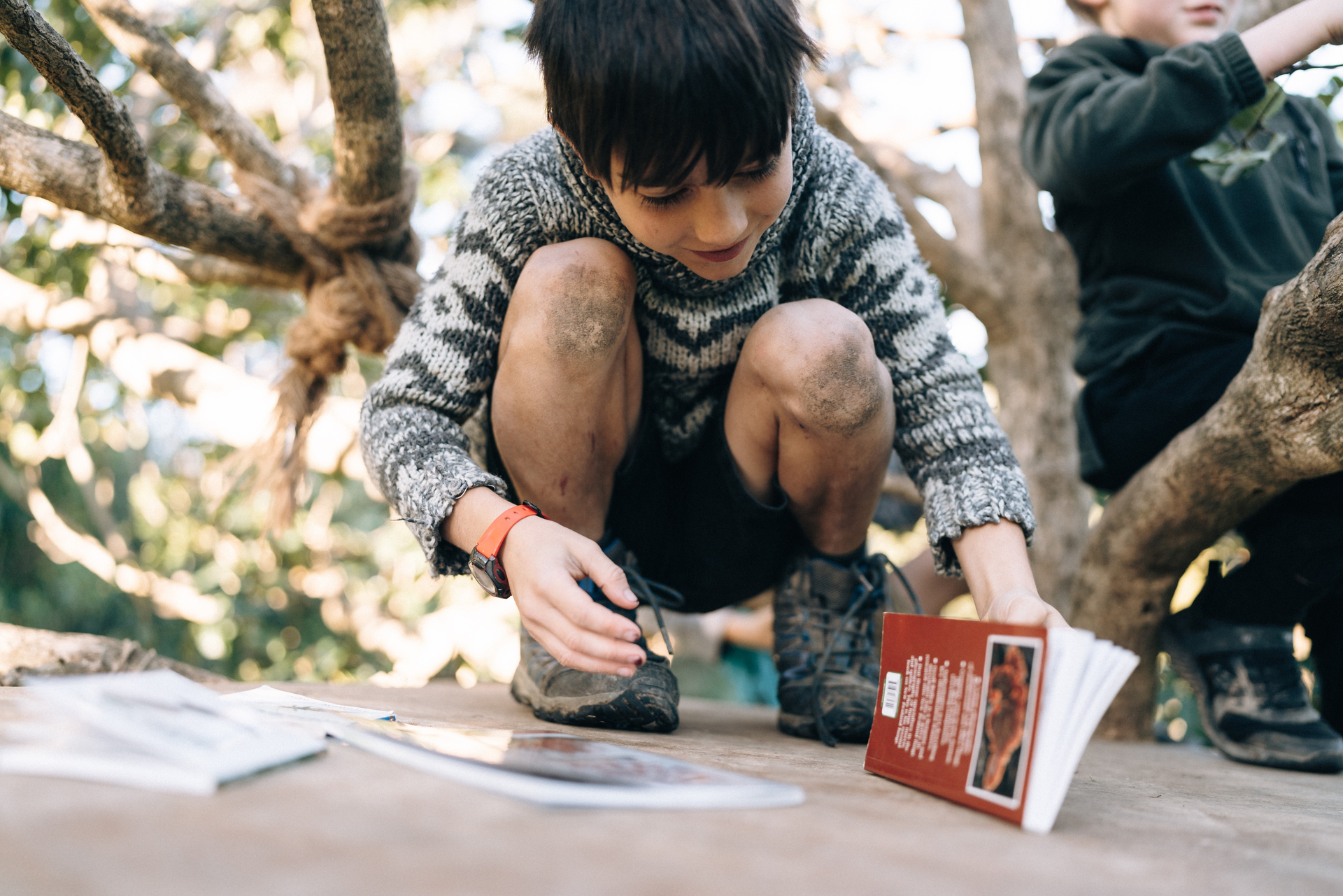 Taking the books outside and getting into nature could help kids ease back into school time without the stress of the classroom environment. Photo / Supplied