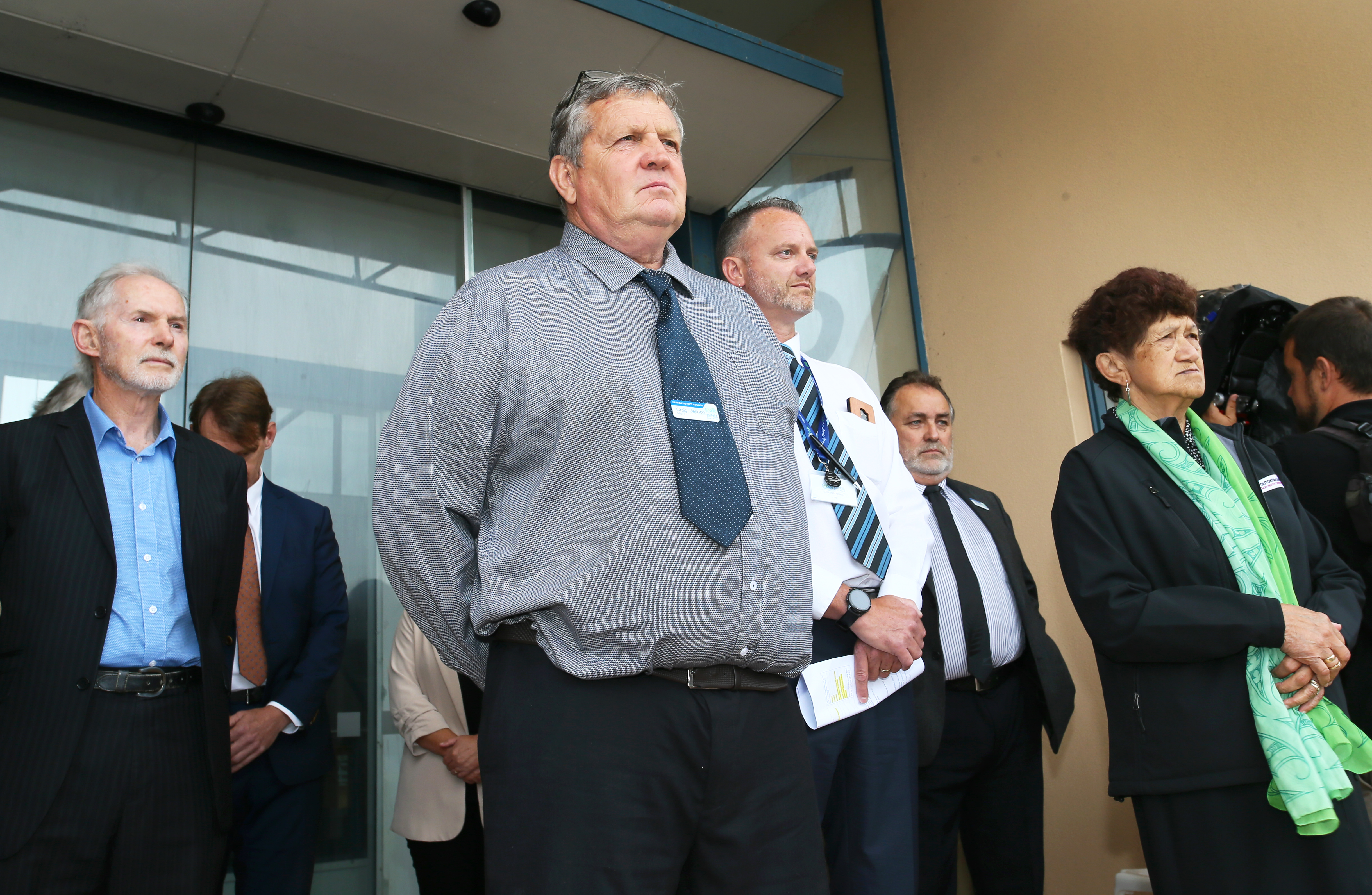 Kaipara Mayor Craig Jepson outside council chambers during a hīkoi over his karakia ban earlier this year. Photo / Tania Whyte
