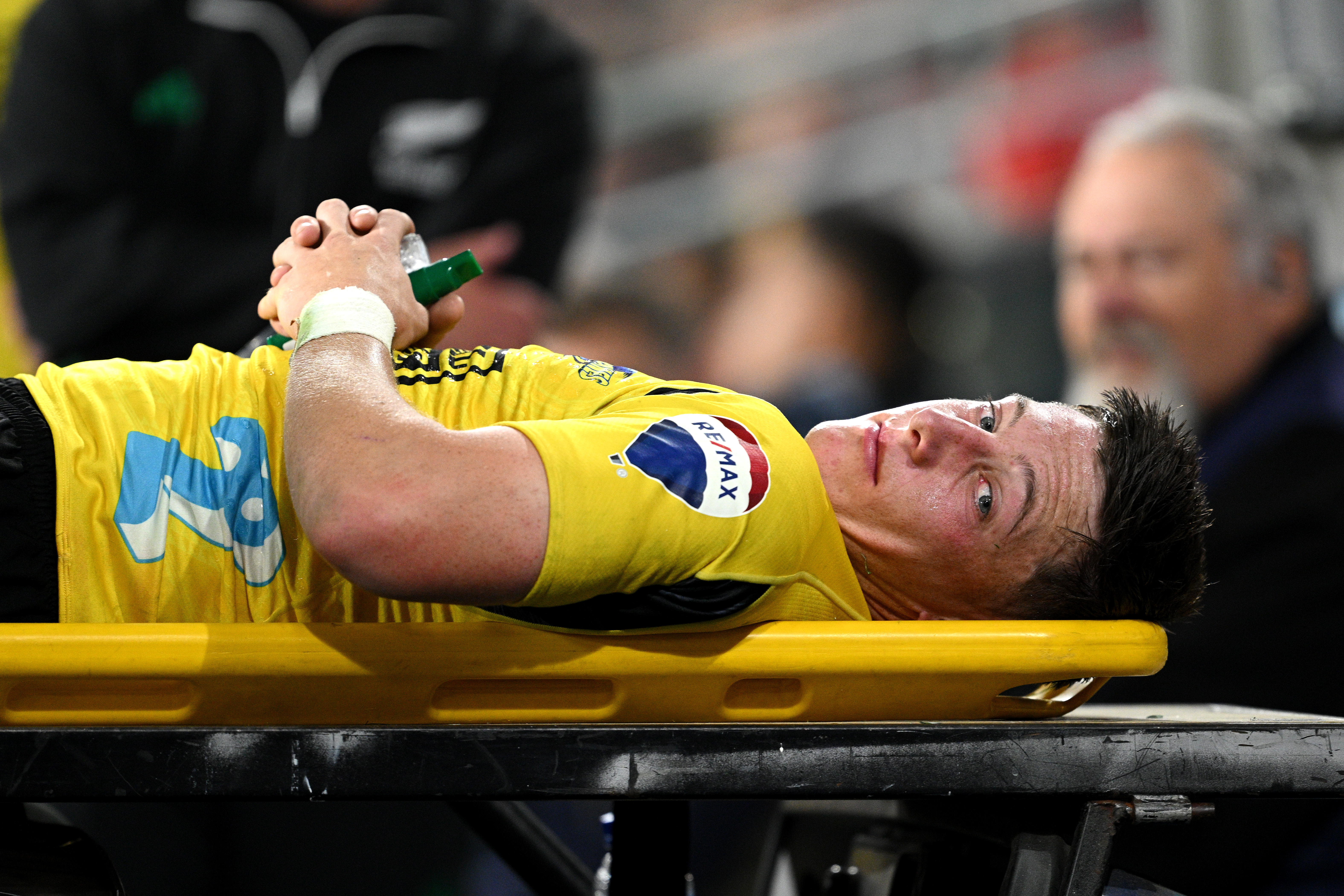 Cam Roigard leaves the field of play after sustaining an injury against the Highlanders. Photo / Getty Images