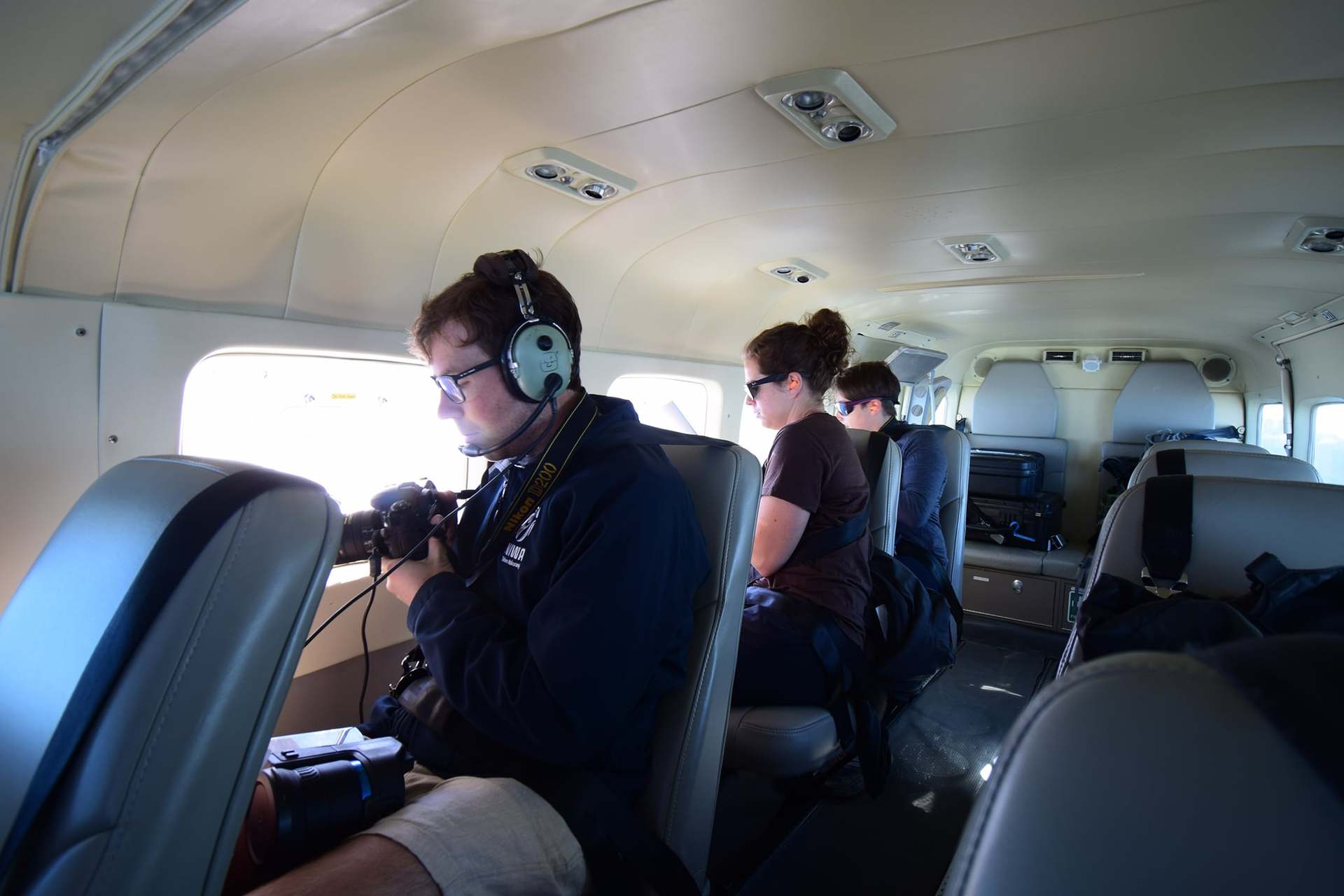 Scientists take part in this year's end of season summer snowline survey. Photo / Warren Chinn
