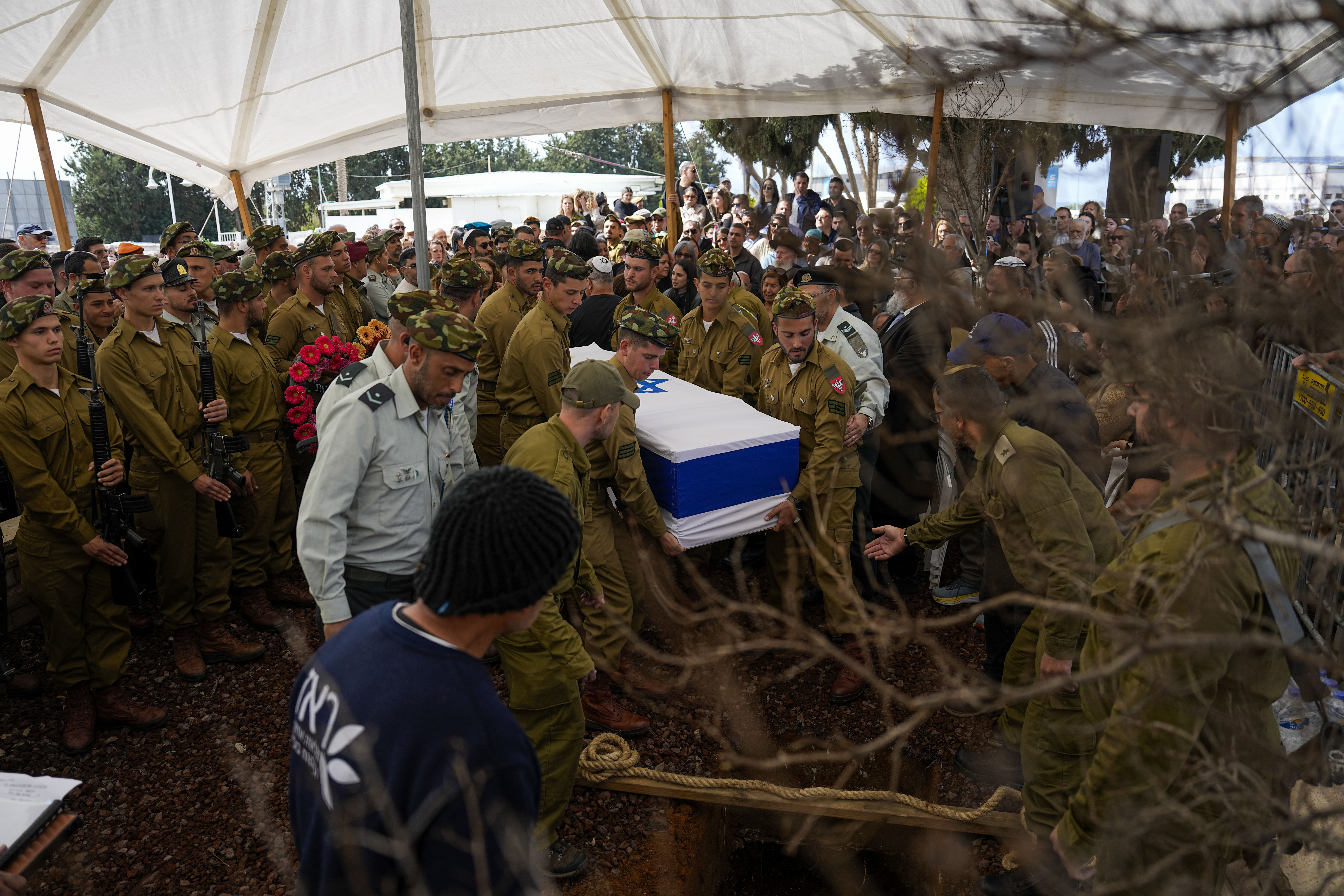 Israeli soldiers carry the casket of Israeli soldier Sergeant Dolev Malca during his funeral in Shlomi, northern Israel, on the border with Lebanon. Photo / AP