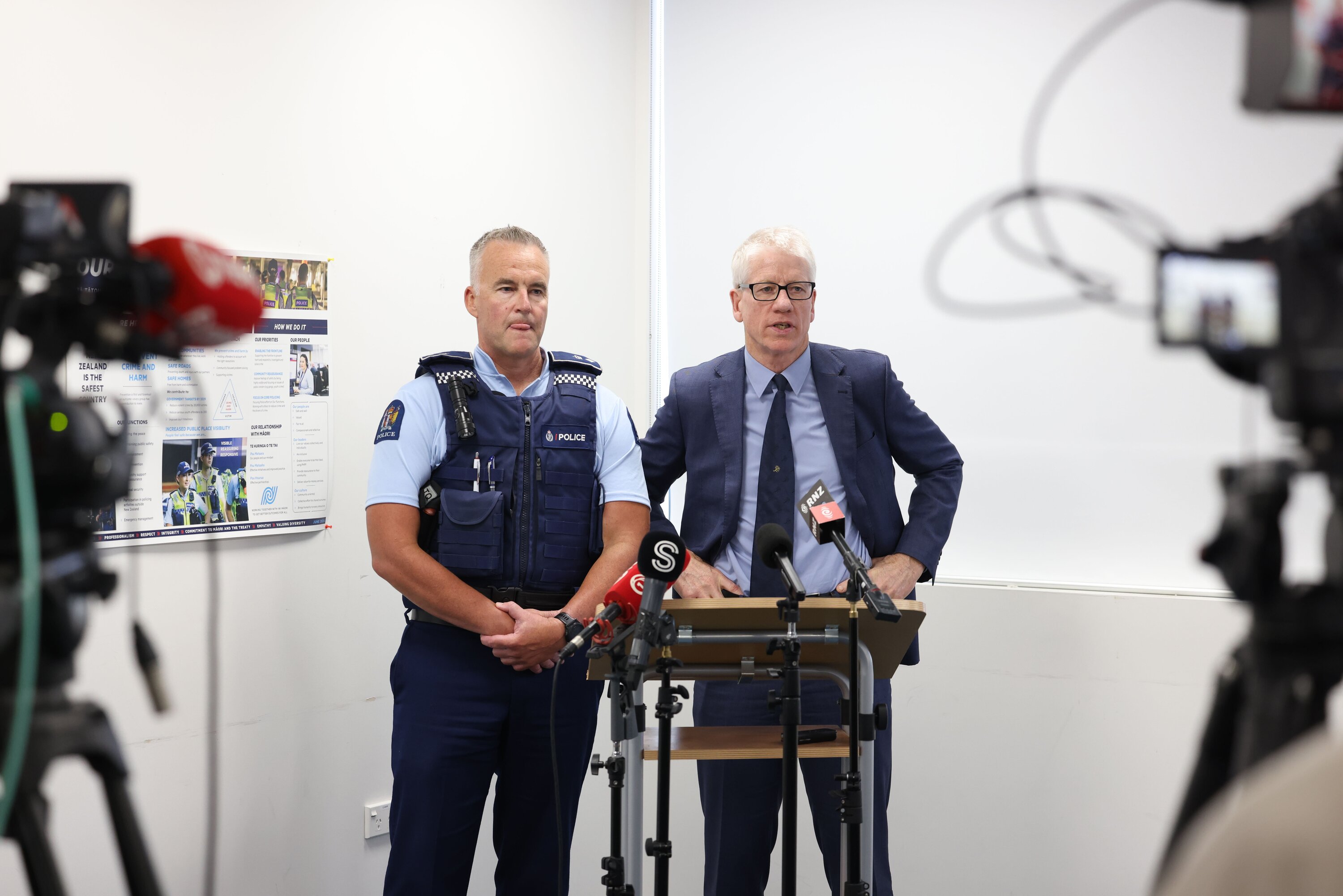 Superintendent Tim Anderson and Detective Superintendent Greg Williams hold a media conference for Operation High Water in Tauranga, a police effort to counter drug dealing and inter-gang violence in Ōpōtiki. 