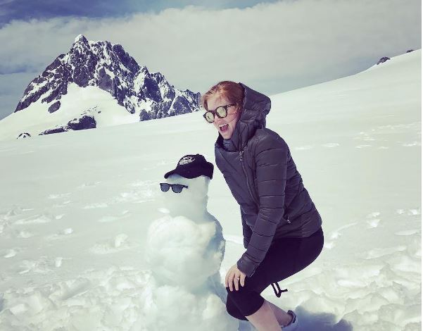 Actress Isla Fisher and an unidentified snowman in the Southern Alps this week. Photo / Instagram