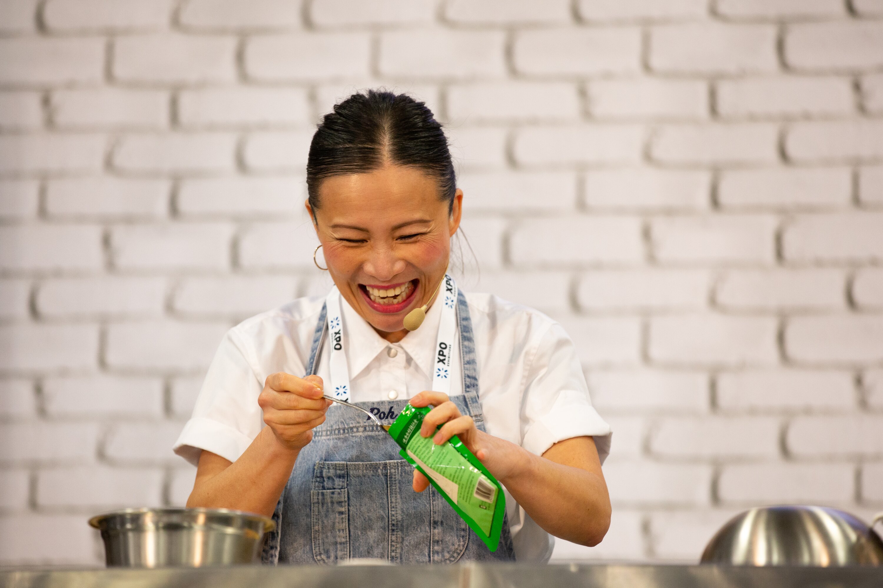 Chaos in the cooking theatre! MasterChef Australia co-host and judge Poh Ling Yeow presenting at the Auckland Food Show. Photo / Sylvie Whinray
