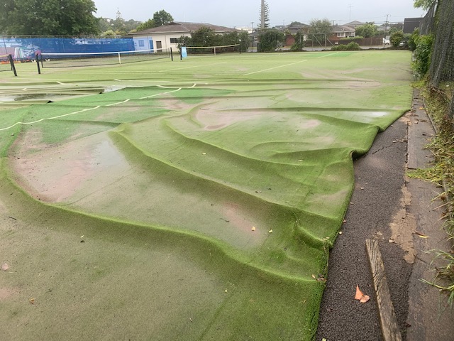 Browns Bay Racquets Club tennis courts, ripped up in the Auckland floods.