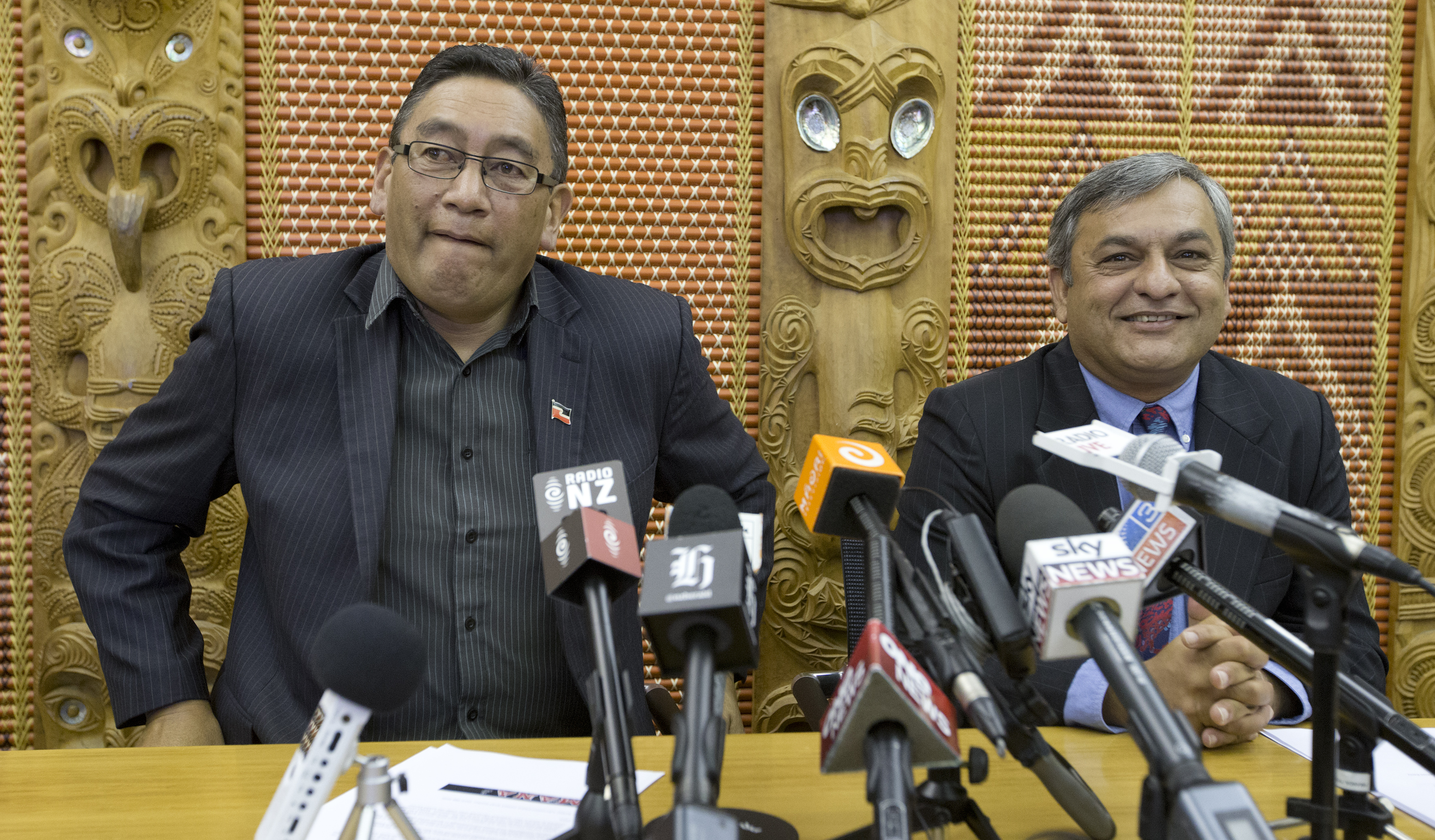 Mana Party leader Hone Harawira, left, and Internet Party chief executive Vikram Kumar announce their deal to form the Internet Mana Party at a press conference at Parliament. Photo / Mark Mitchell