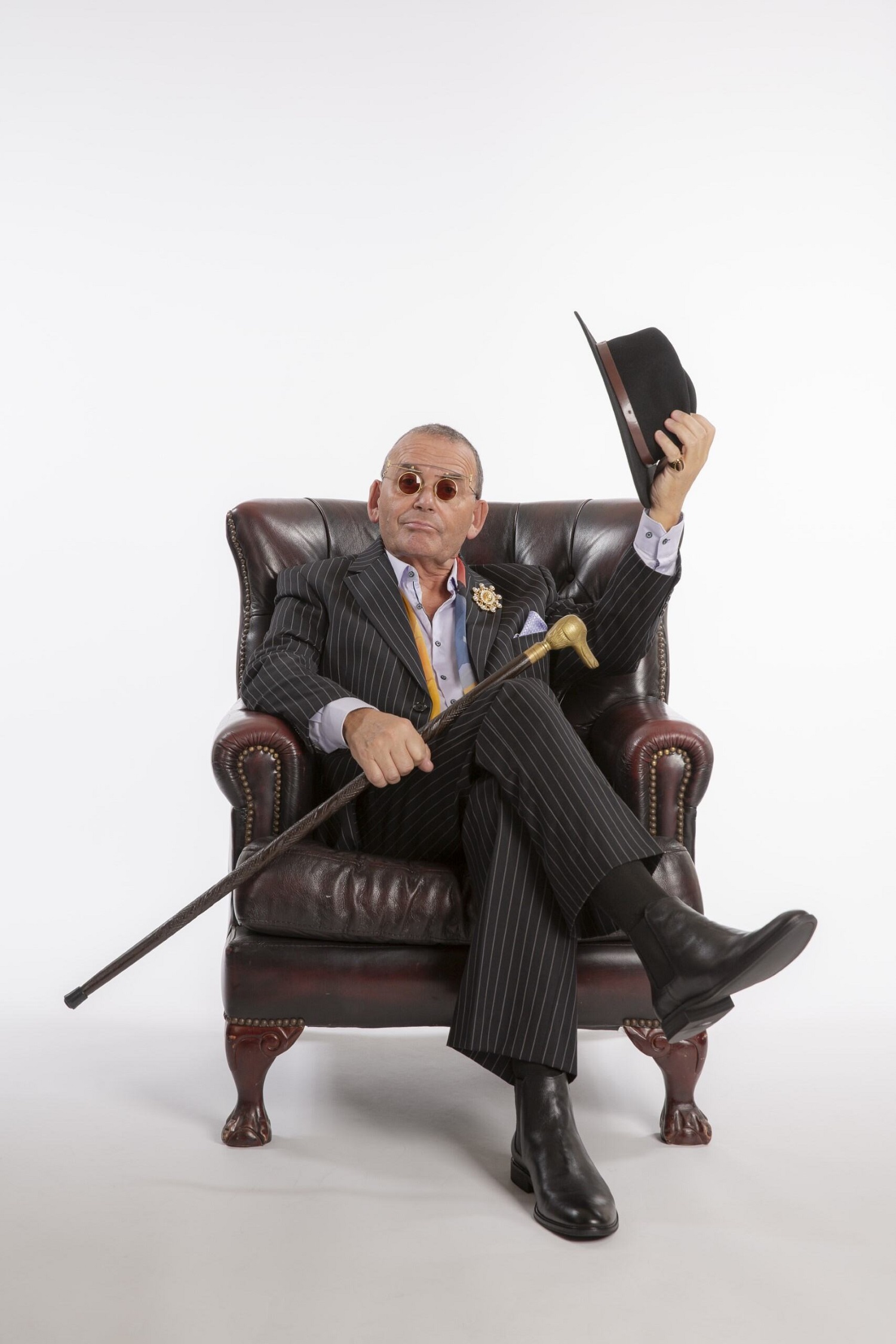 Paul Henry's trademark cane and hats are back.