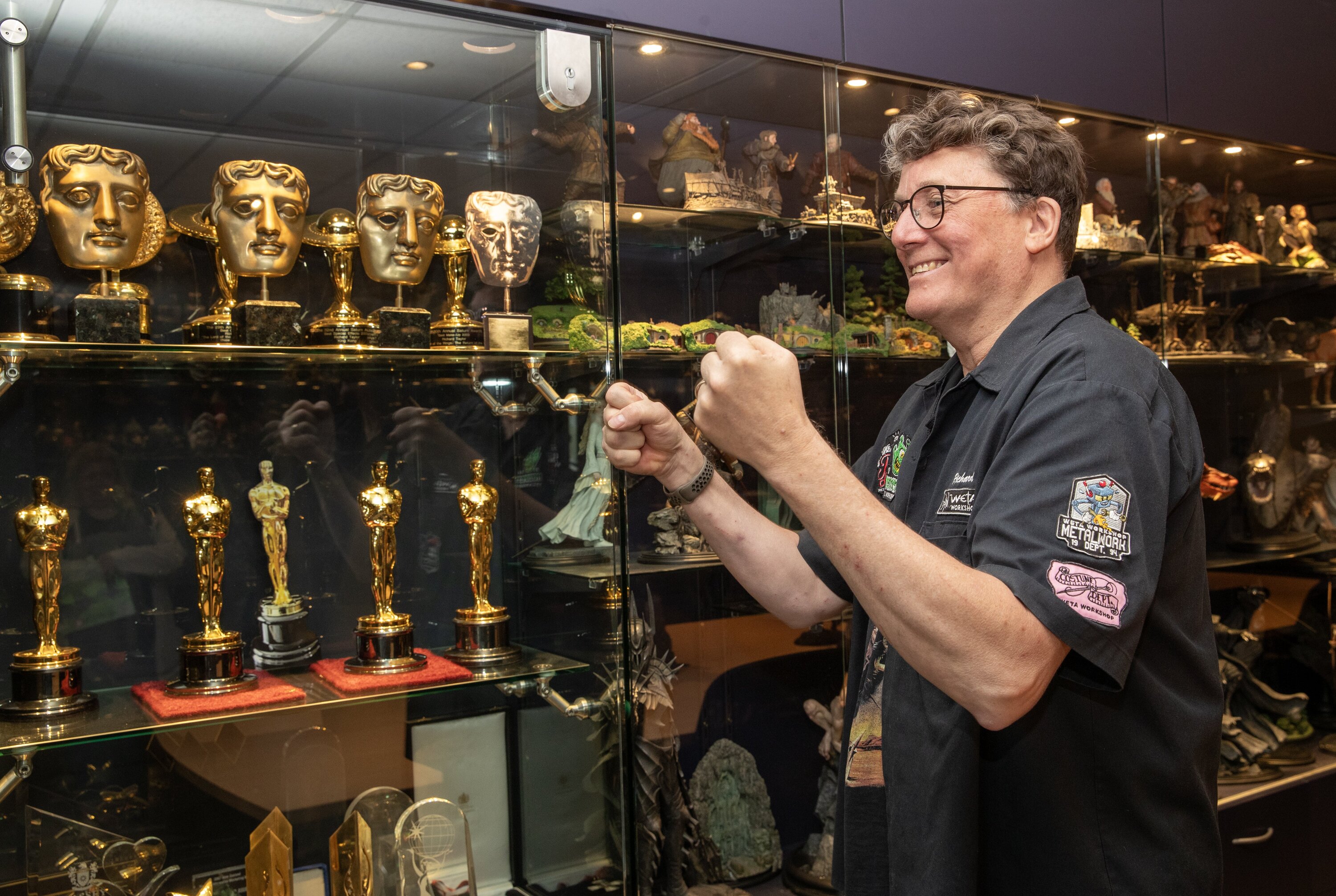 Sir Richard Taylor at the trophy cabinet at Wētā' Workshop in Wellington. Photo / Mark Mitchell