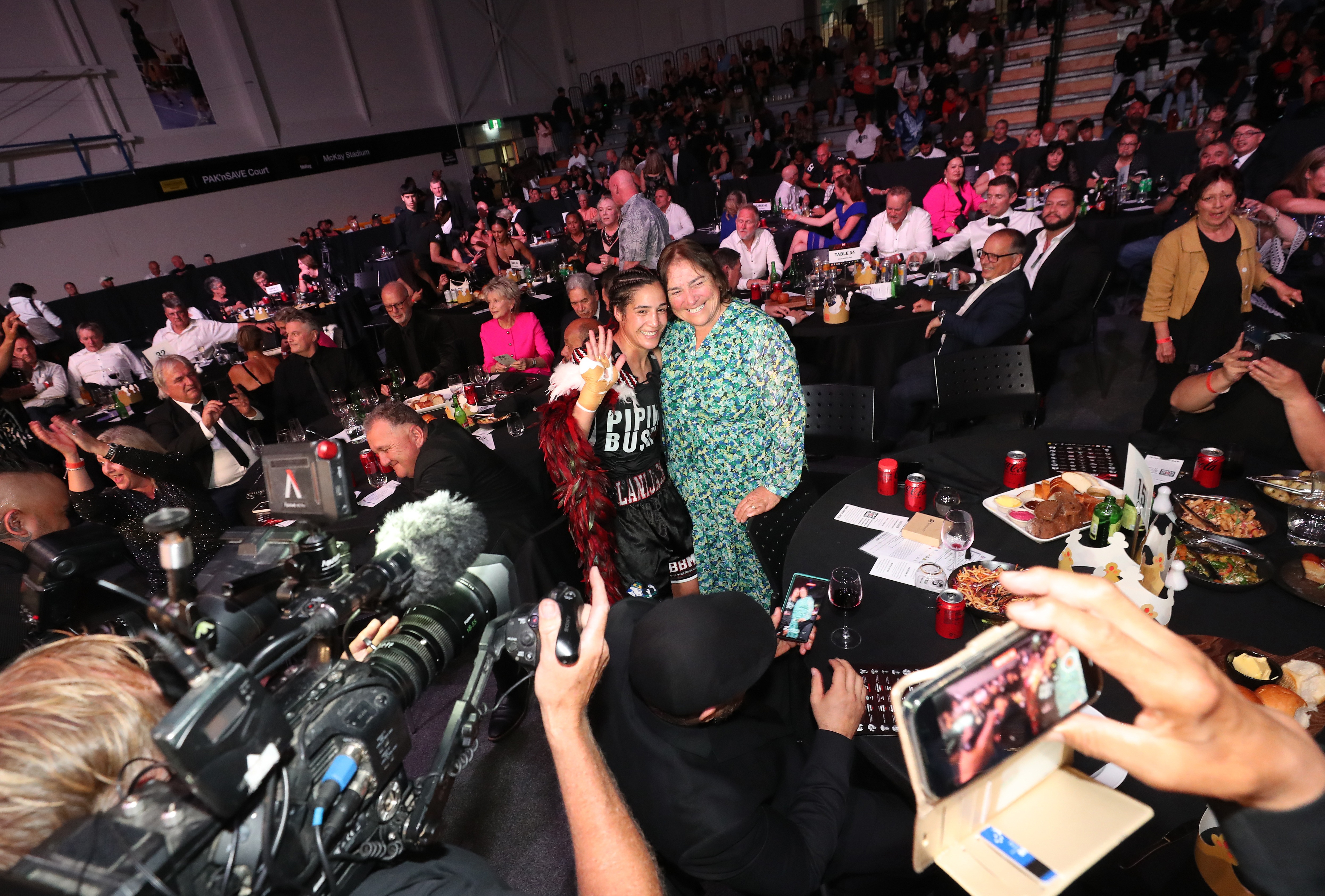 What do you do when you’ve just become the country’s first double world boxing champ? If you’re IBF light heavyweight and IBF heavyweight world champ Lani Daniels, you go straight to get a ringside hug from mum Agnes Daniels.