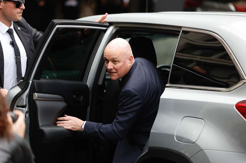 National leader Christopher Luxon arrives at the Cordis Hotel in Auckland for ongoing coalition talks with NZ First leader Winston Peters. Photo / Michael Craig