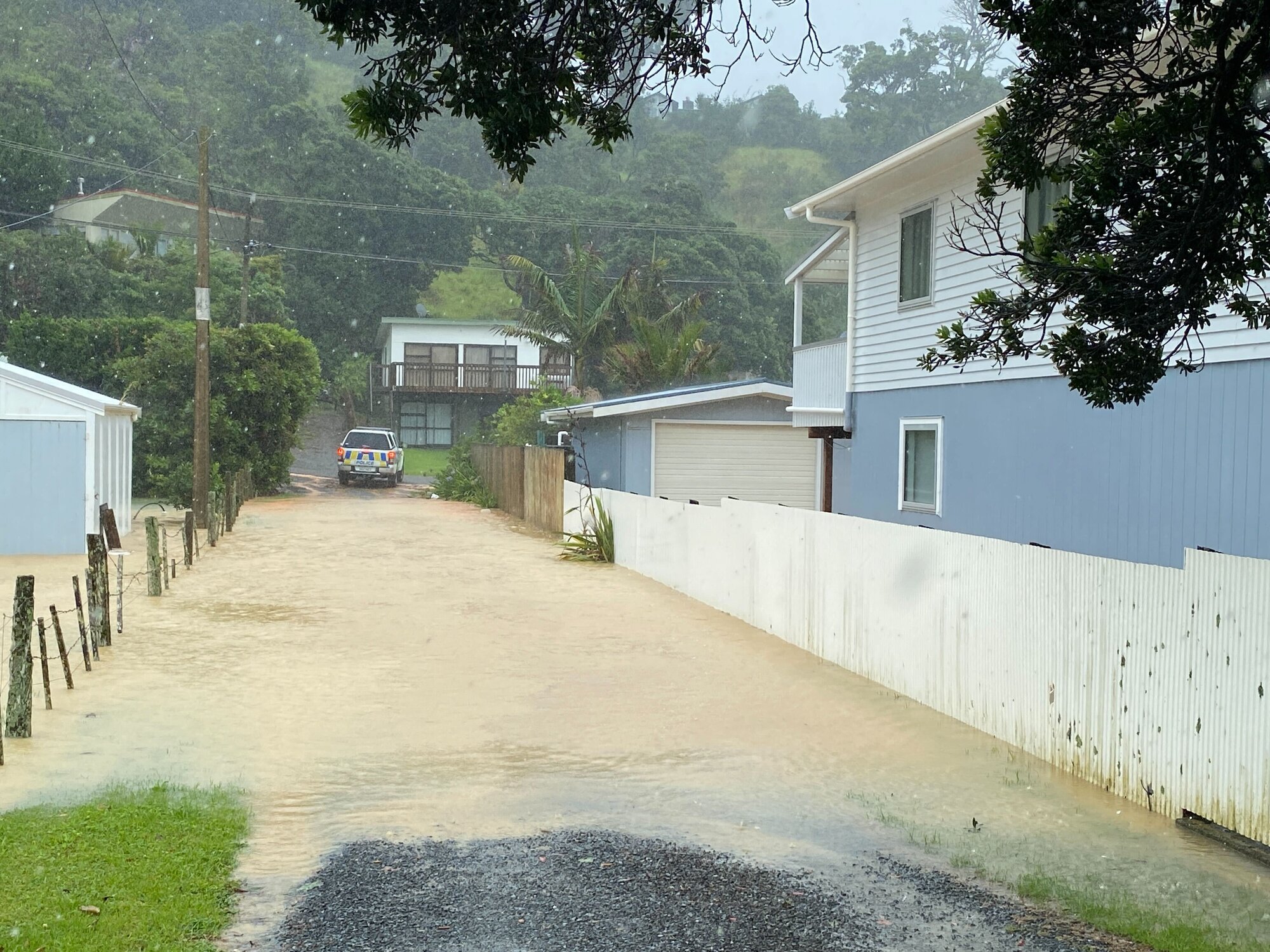 Homes were evacuated on Wednesday at the coastal settlement of Ōakura, due to the threat of slips and flooding. Photo / Denise Piper 