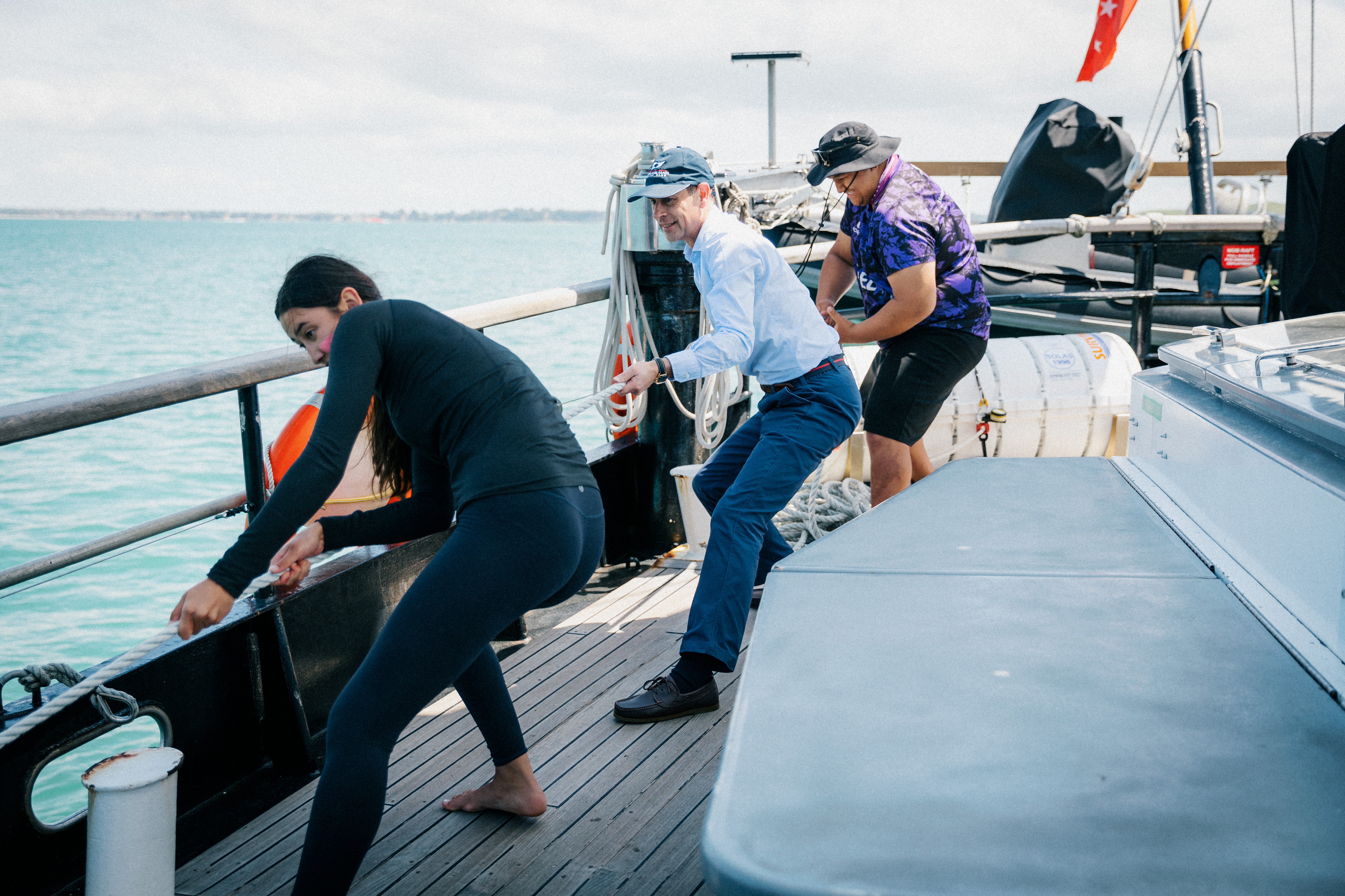 Prince Edward got hands on aboard the boat, helping hoist the sails.