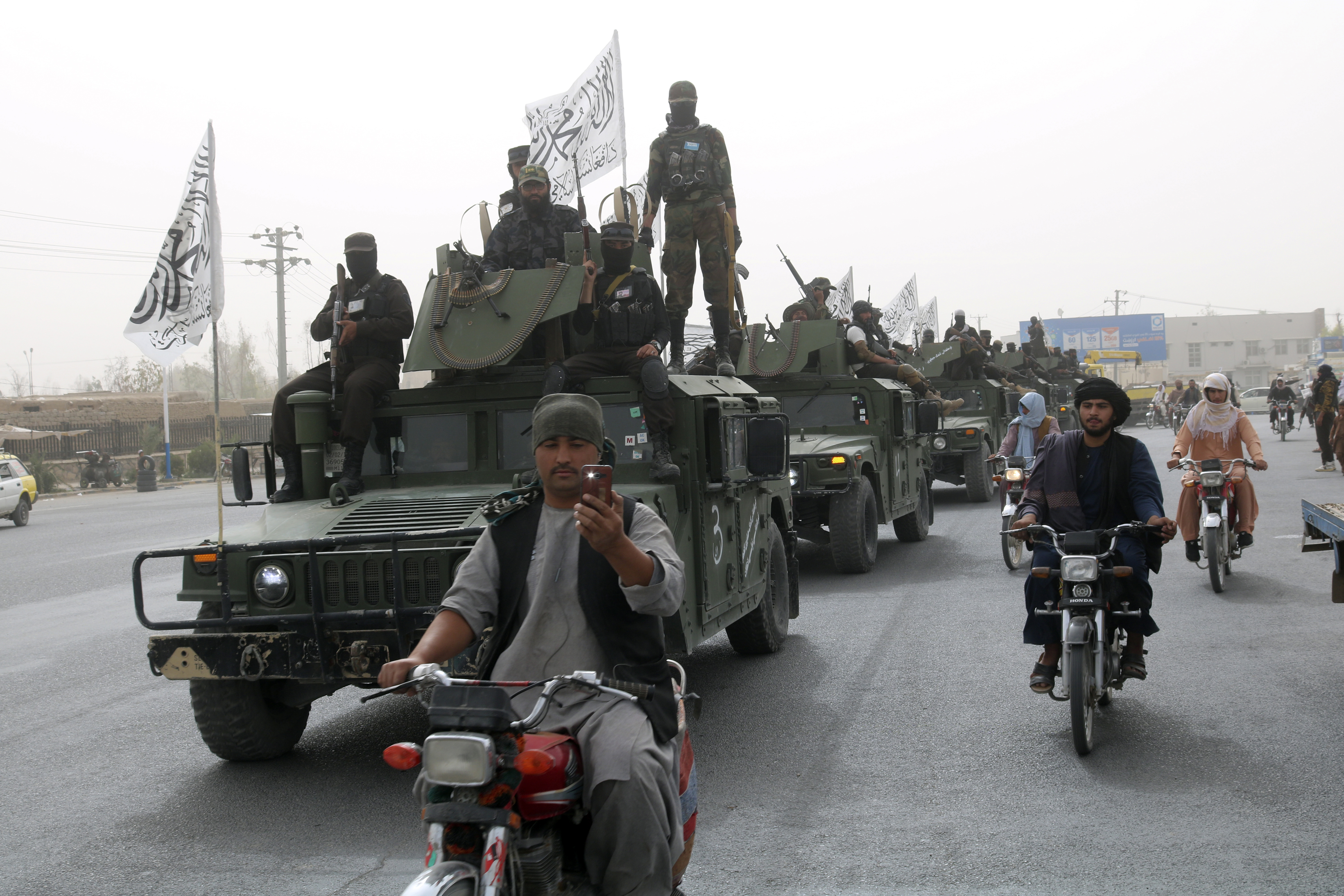 Taliban fighters patrol during a celebration marking the second anniversary of the withdrawal of US-led troops from Afghanistan. Photo / AP