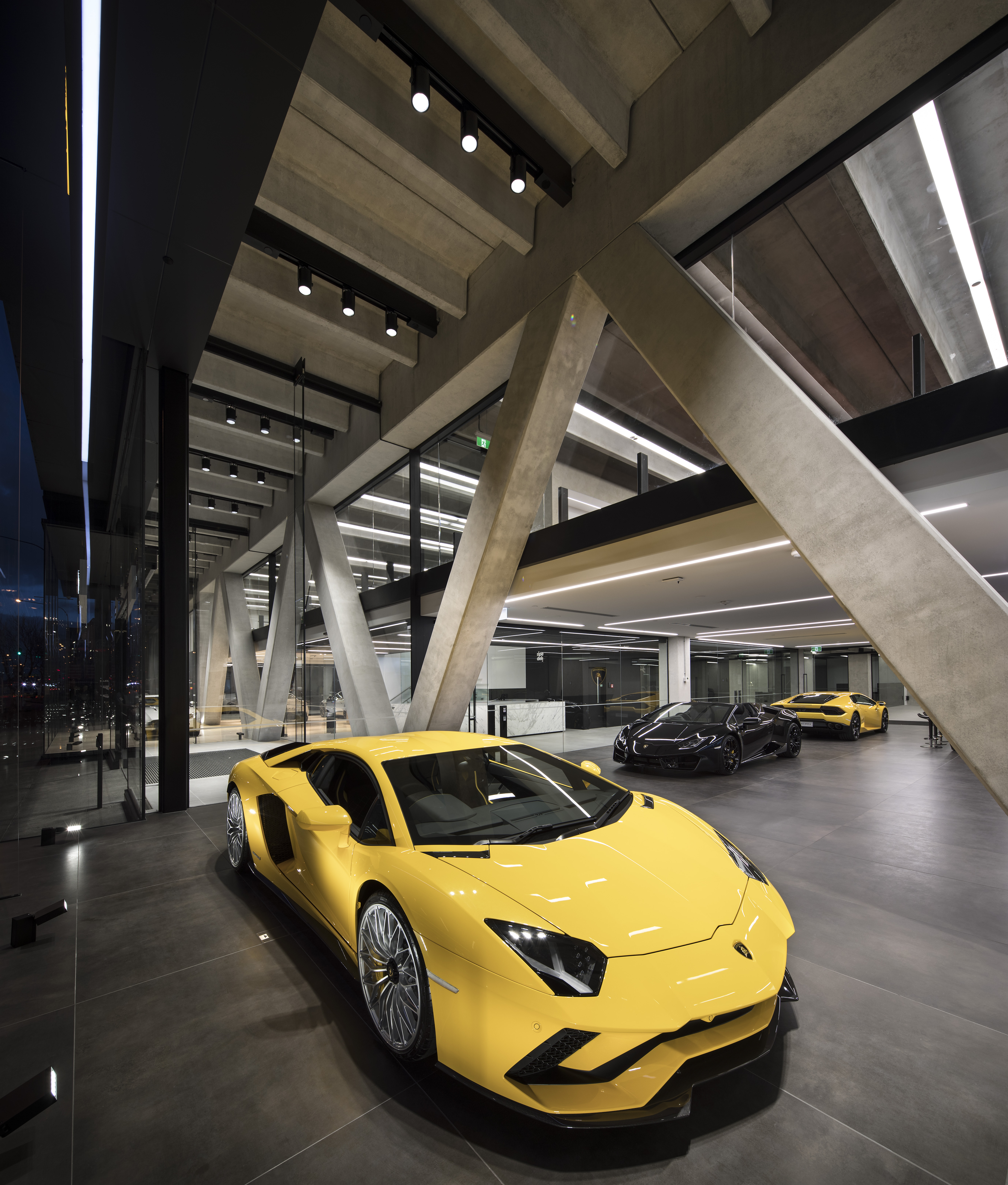 The showroom features three of the world's top car brands.