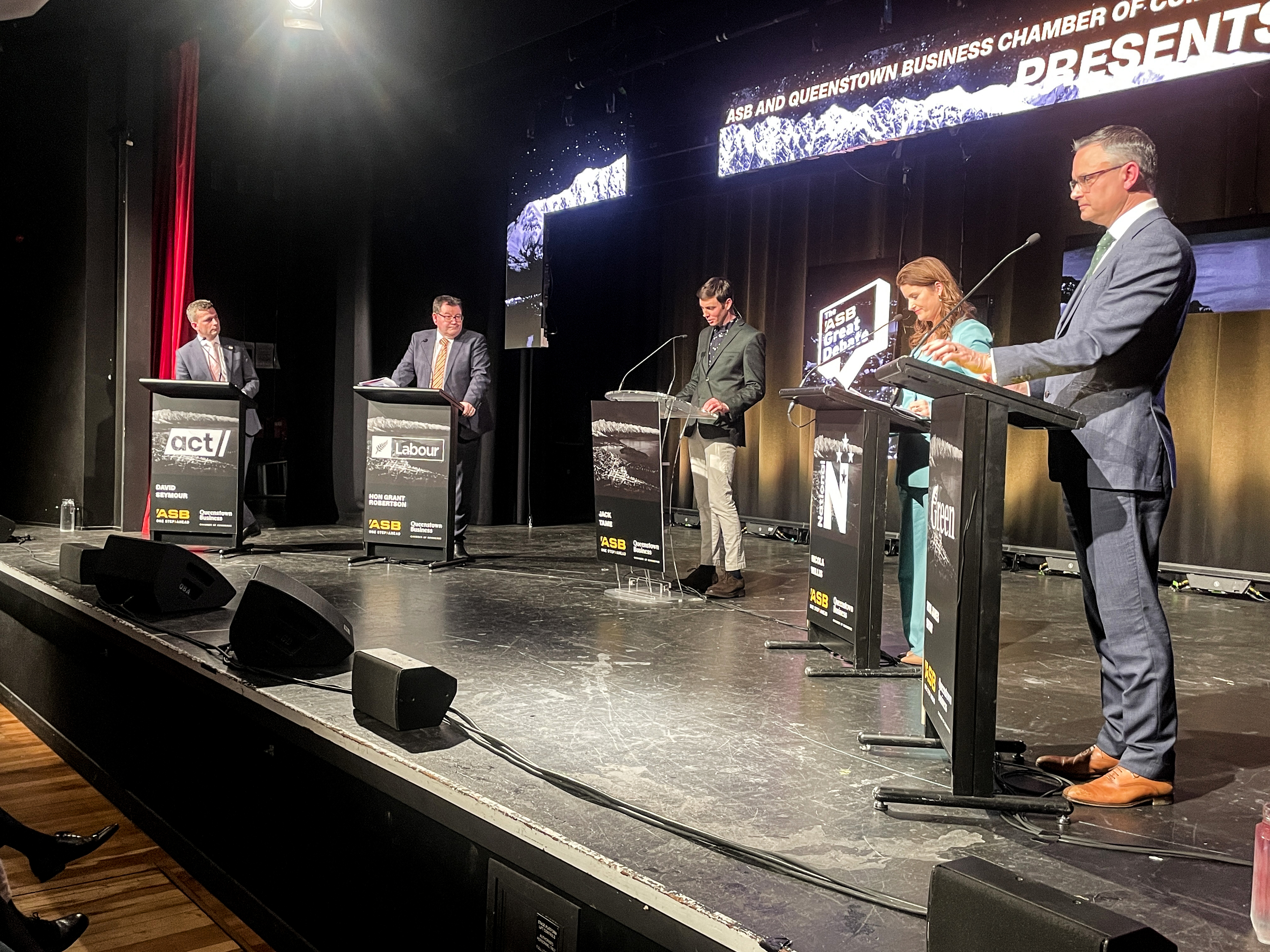 The ASB Finance Debate in Queenstown with l-r: David Seymour, leader of Act, Labour's Grant Robertson, Jack Tame, National's Nicola Willis, and the Green's James Shaw. Photo / Derek Cheng