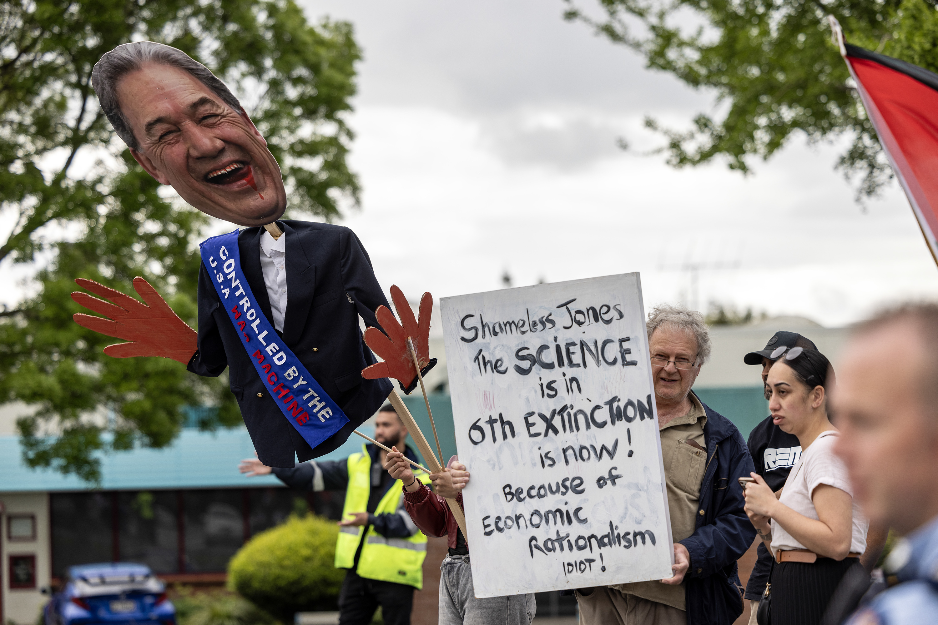 Police have arrested two people after protesters accosted Winston Peters and pushed Shane Jones at NZ First's national conference in Hamilton today. Photo / Mike Scott