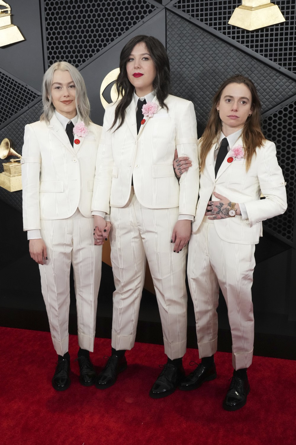 Phoebe Bridgers, Lucy Dacus, and Julien Baker arrive at the 66th annual Grammy Awards in Los Angeles. Photo / AP