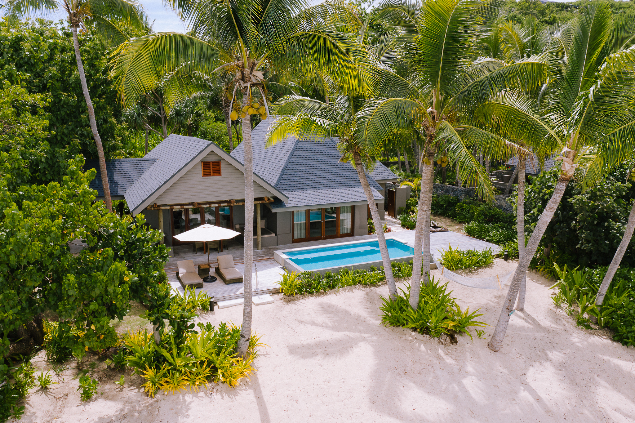 A one-bedroom private villa with pool exemplifies Kokomo's exclusive island accommodation.