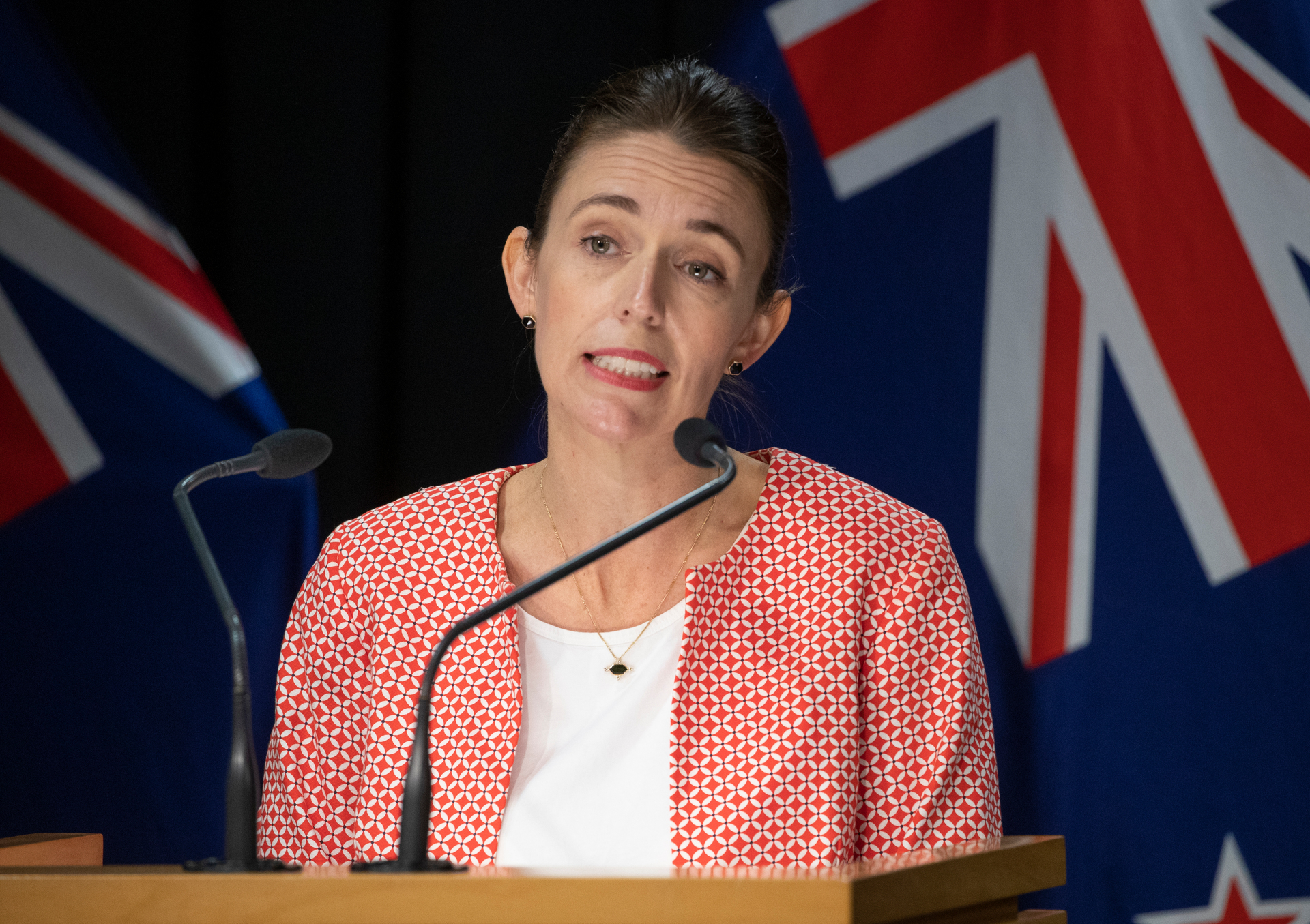 Prime Minister Jacinda Ardern announcing the country will move to red traffic light setting. Photo / Mark Mitchell