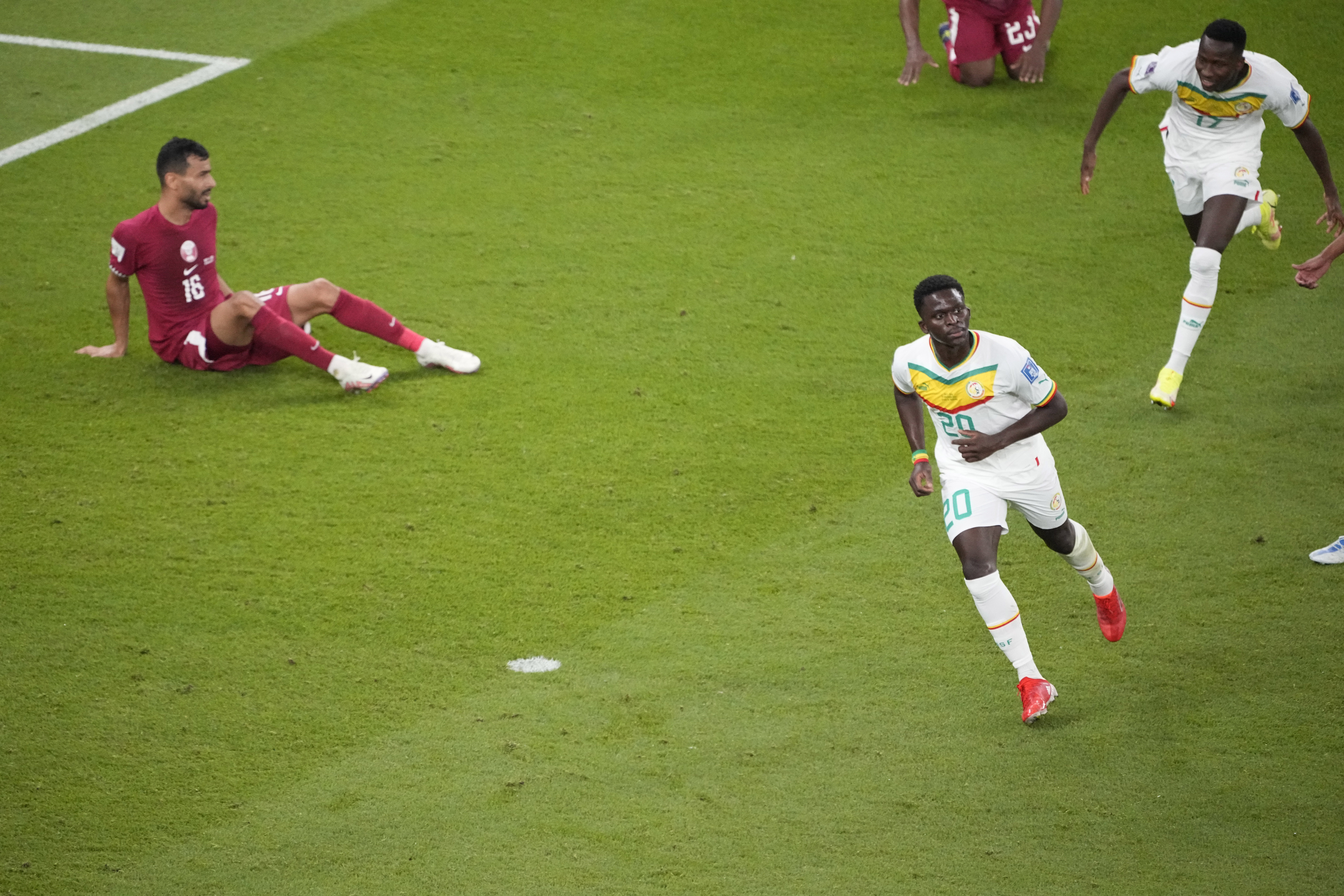 Senegal's Bamba Dieng celebrates after scoring against Qatar. Photo / AP