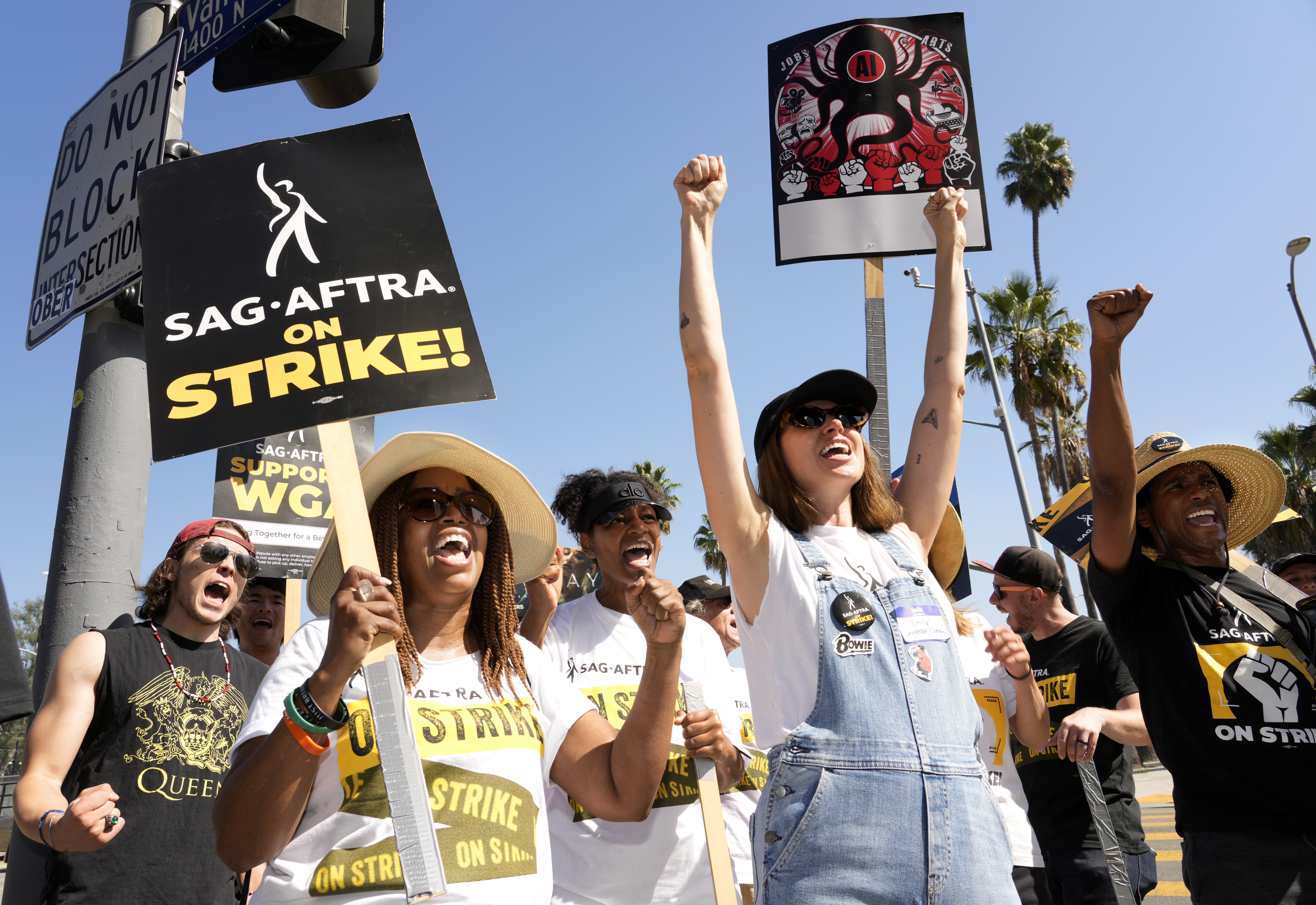 Striking actors Jennifer Leigh Warren (left) and Emily Kincaid (right), demonstrate outside Netflix studios. Photo / AP