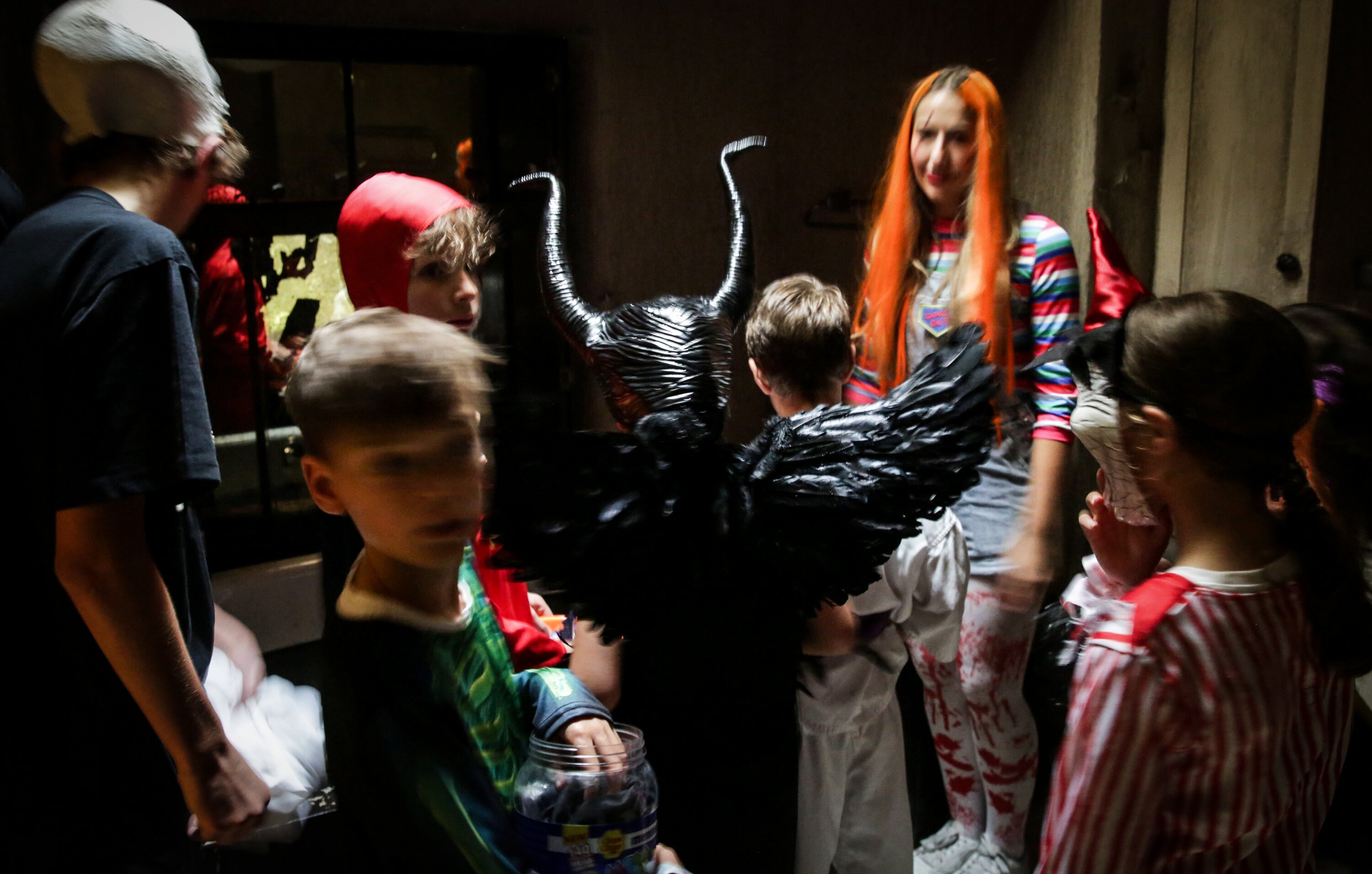 Children dressed in Halloween costumes queue at the Zuru founder's Mowbray house in Herne Bay, Auckland for Trick or Treat Zuru toys and lollies
New Zealand Herald photograph by Sylvie Whinrary 31 October 2024