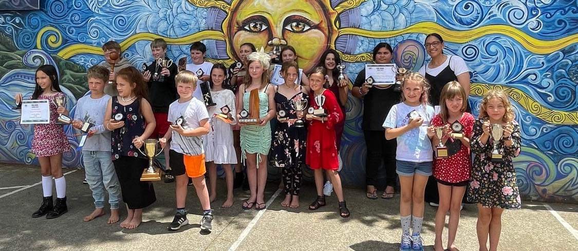 The recipients of awards at the Peria School prizegiving for 2023, with Principal Ariana Williams.
