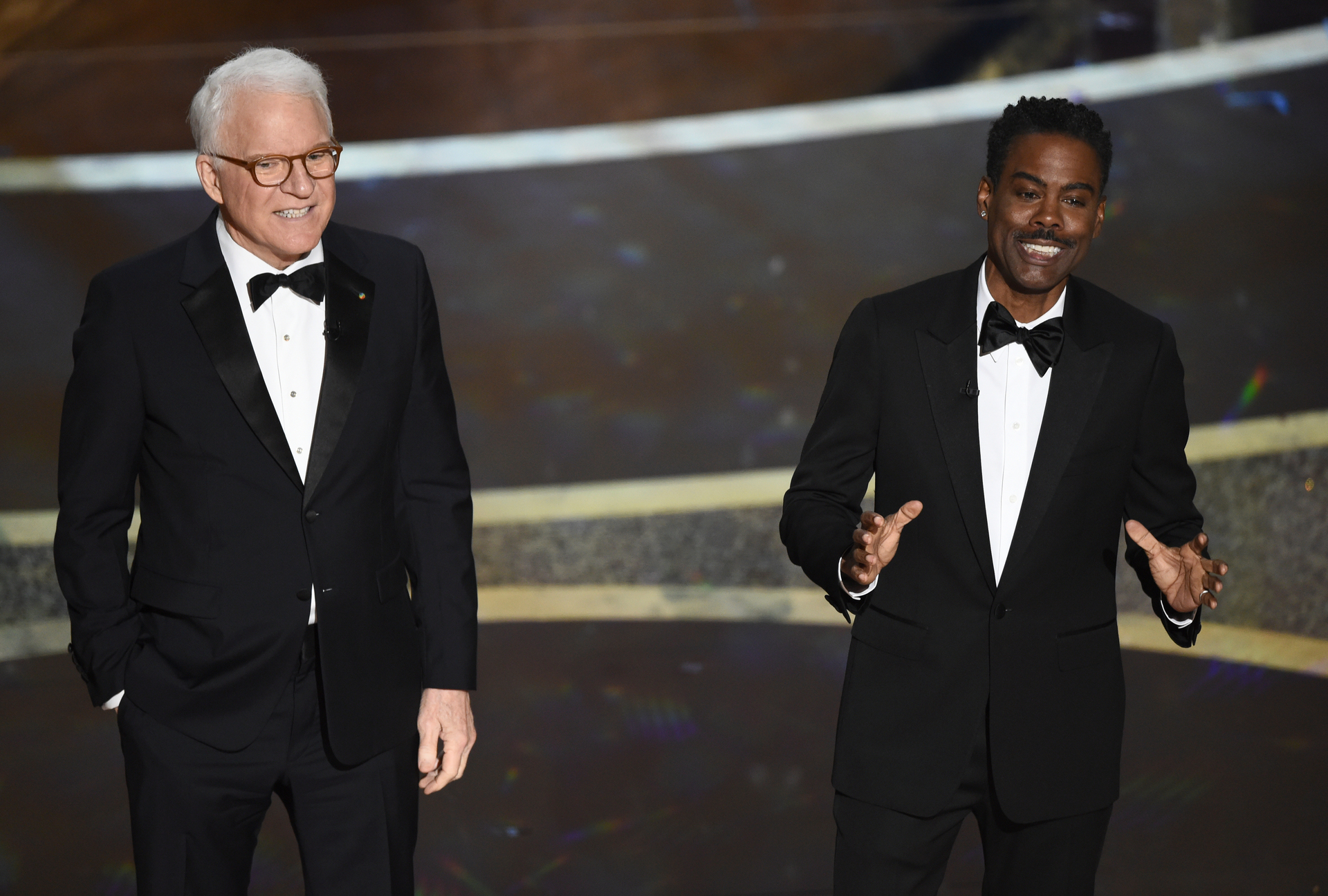 Steve Martin, left, and Chris Rock speak at the Oscars. Photo / AP