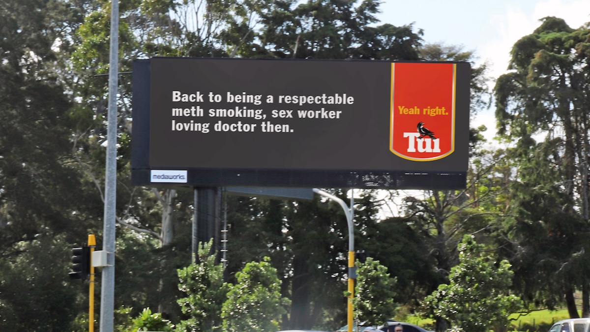 A Tui beer billboard referencing Phillip Polkinghorne, the retired eye surgeon acquitted of murdering his wife, has been slammed as being in bad taste and disrespectful.