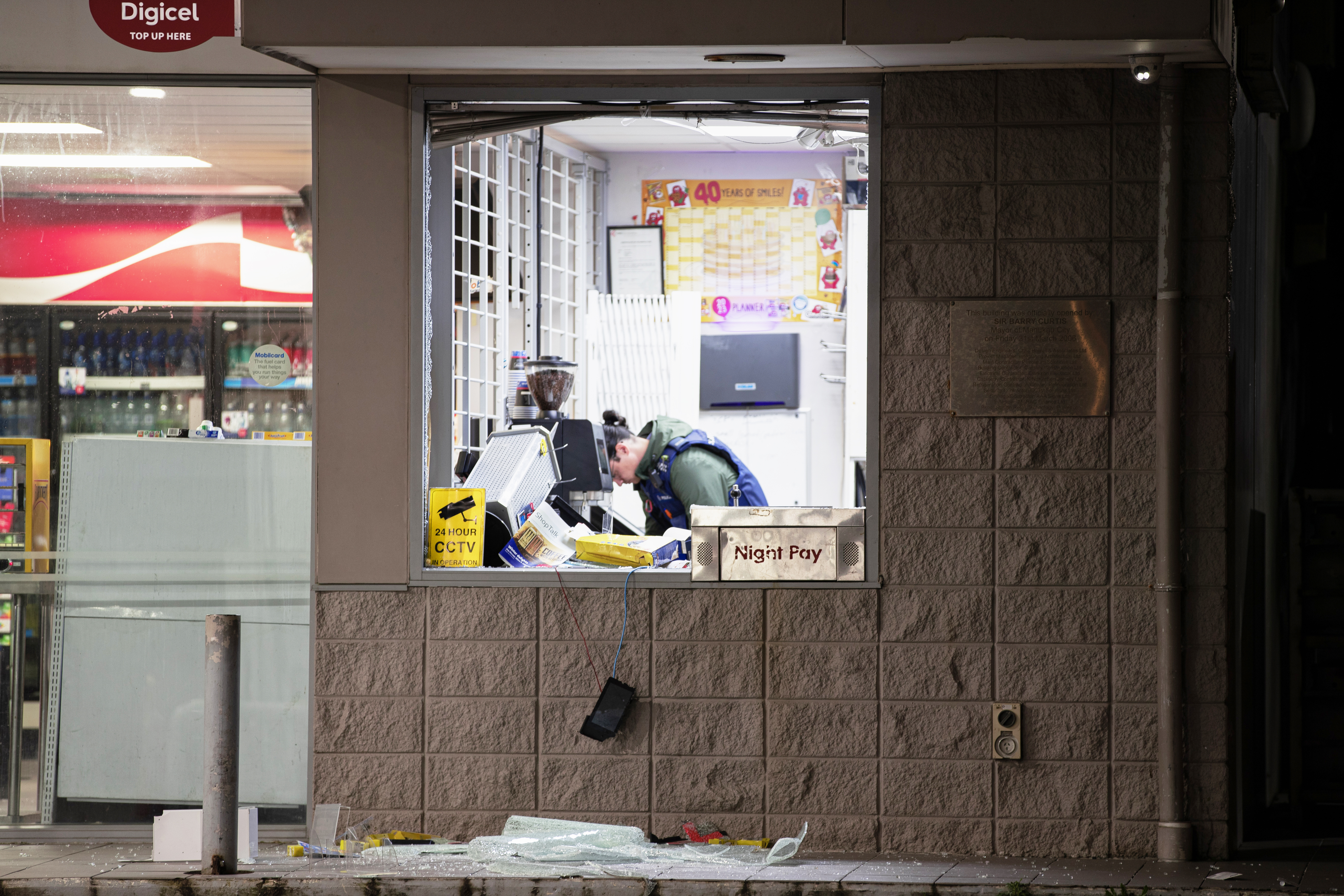 Windows have been smashed at Mobil on Massey Road, Māngere following a burglary. Photo / Hayden Woodward