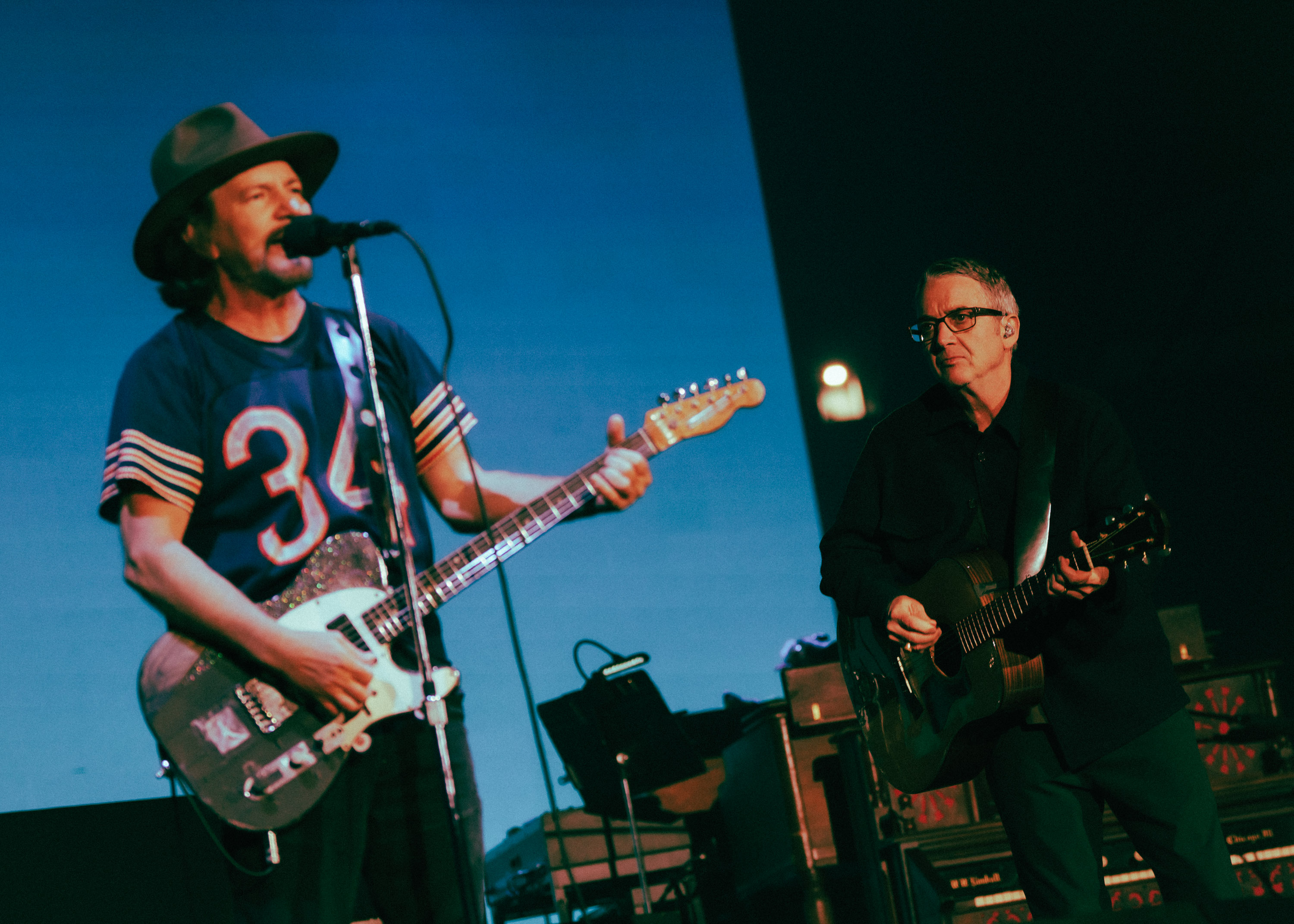 Eddie Vedder (left) on stage at Auckland’s Mt Smart Stadium for Pearl Jam’s Dark Matter tour. Photo / Tom Grut (Frog Productions)