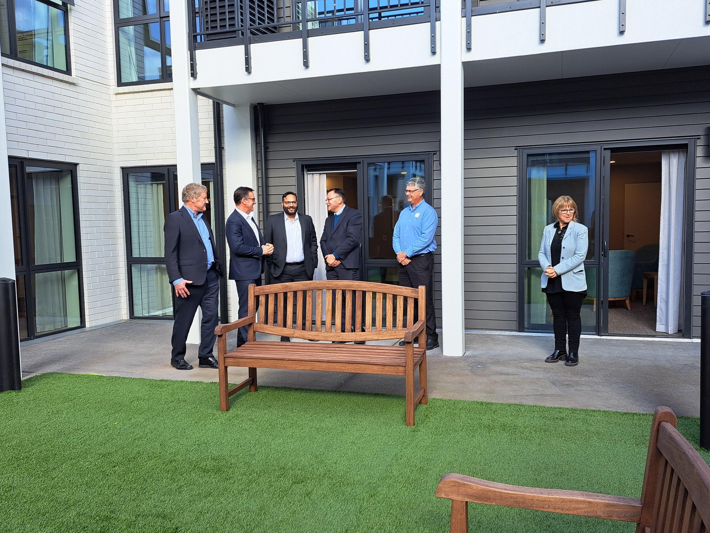 Health Minister Shane Reti and Northland MP Grant McCallum talk with Metlifecare staff during a visit to the newly constructed Oakridge Villas Care Home. Photo / Jenny Ling