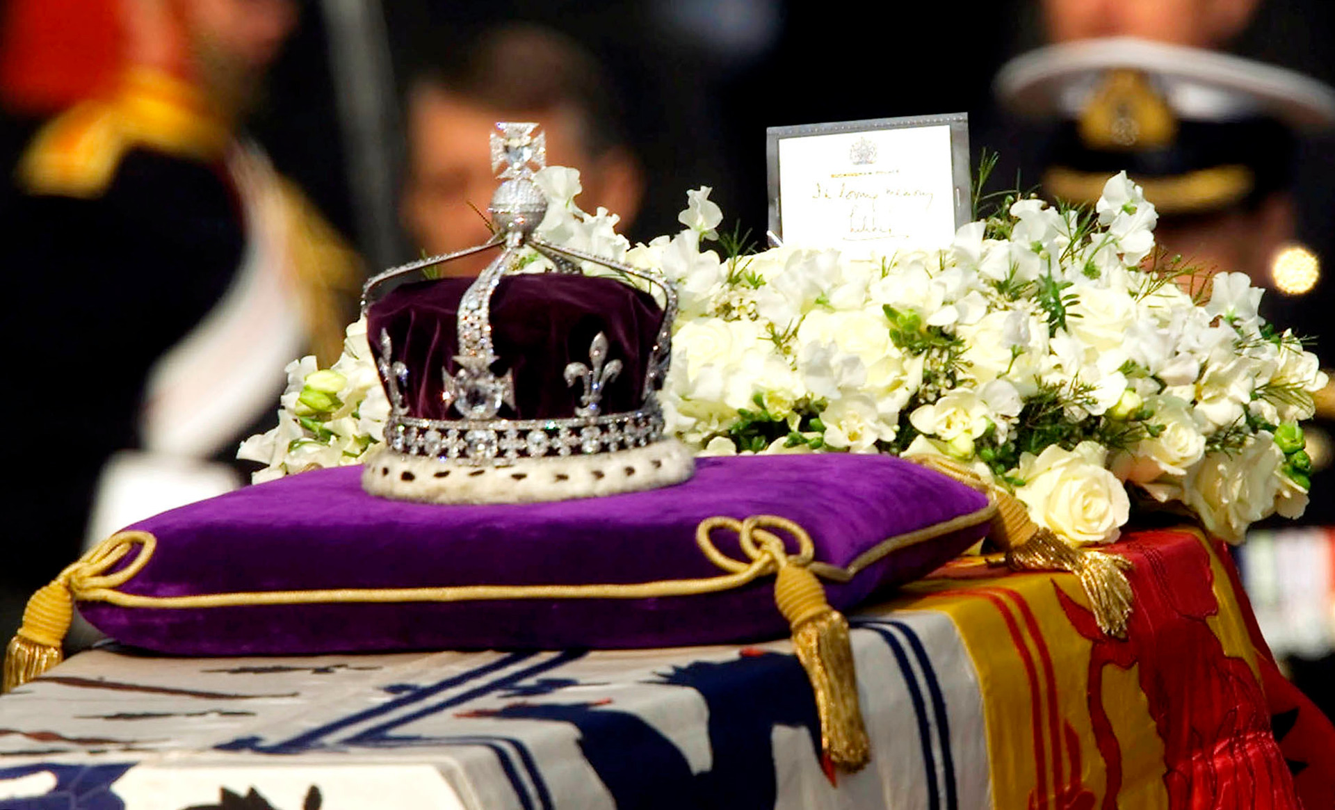 The Queen Mother's coffin and her coronation crown with the priceless Koh-I-Noor diamond. Photo / AP