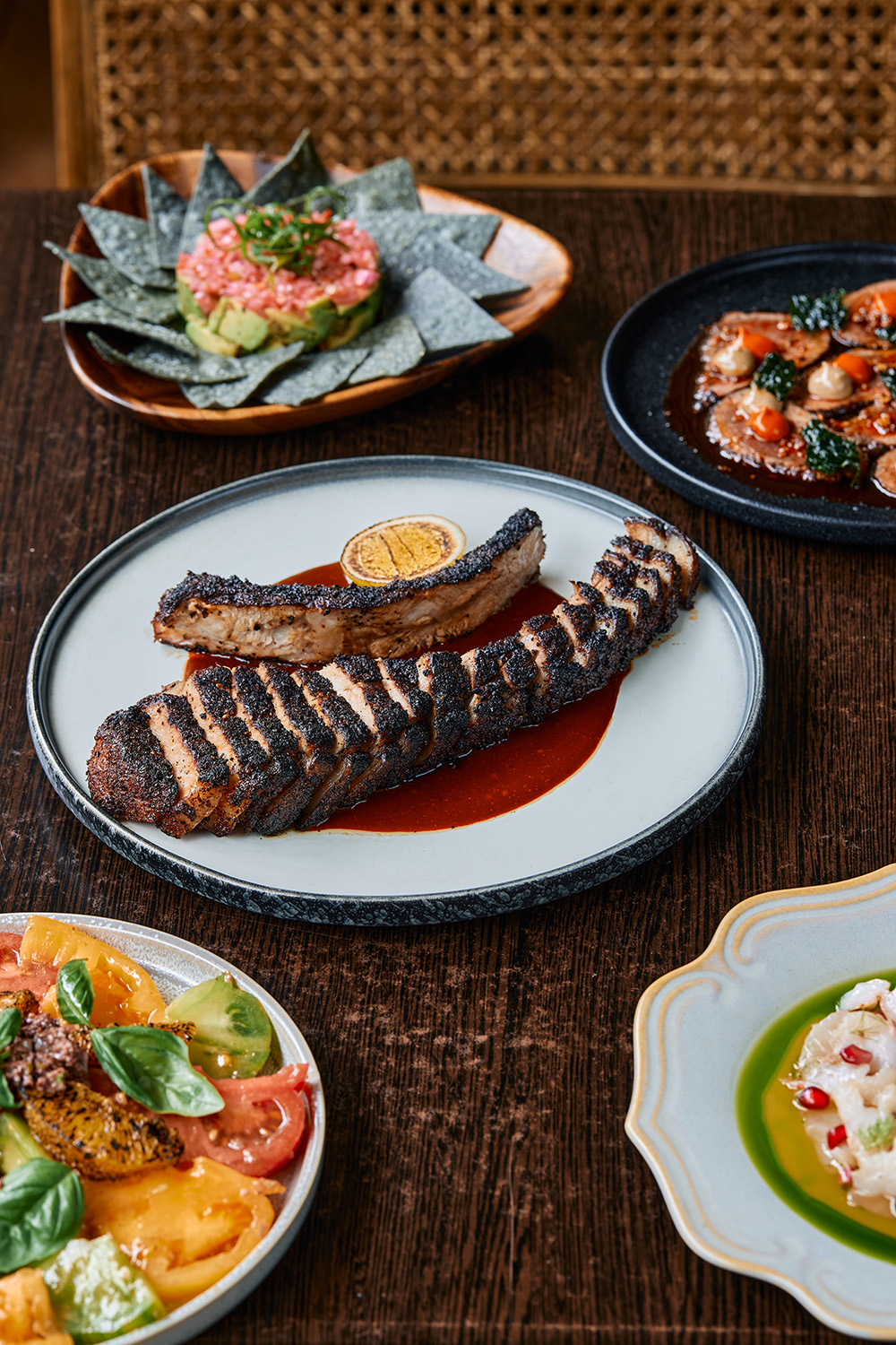 The smoked pork chop with pasilla roja, chilli, paprika, salsa picante and pomegranate molasses on the menu at Milenta. Photo / Babiche Martens