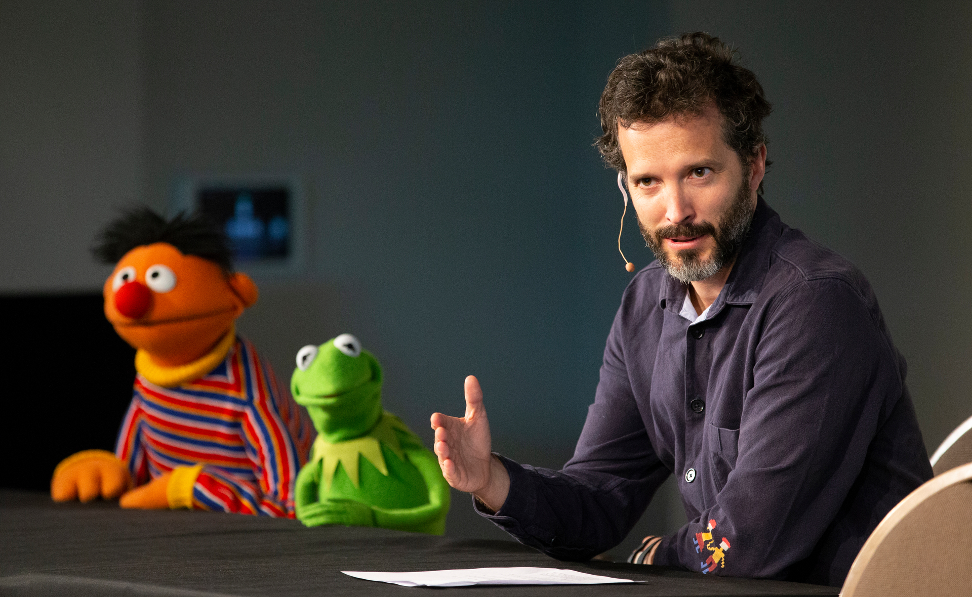 Bret McKenzie with Sesame Street's Ernie and the Muppet's Kermit during the 2018 Jim Henson Retrospectacle press conference in Wellington.